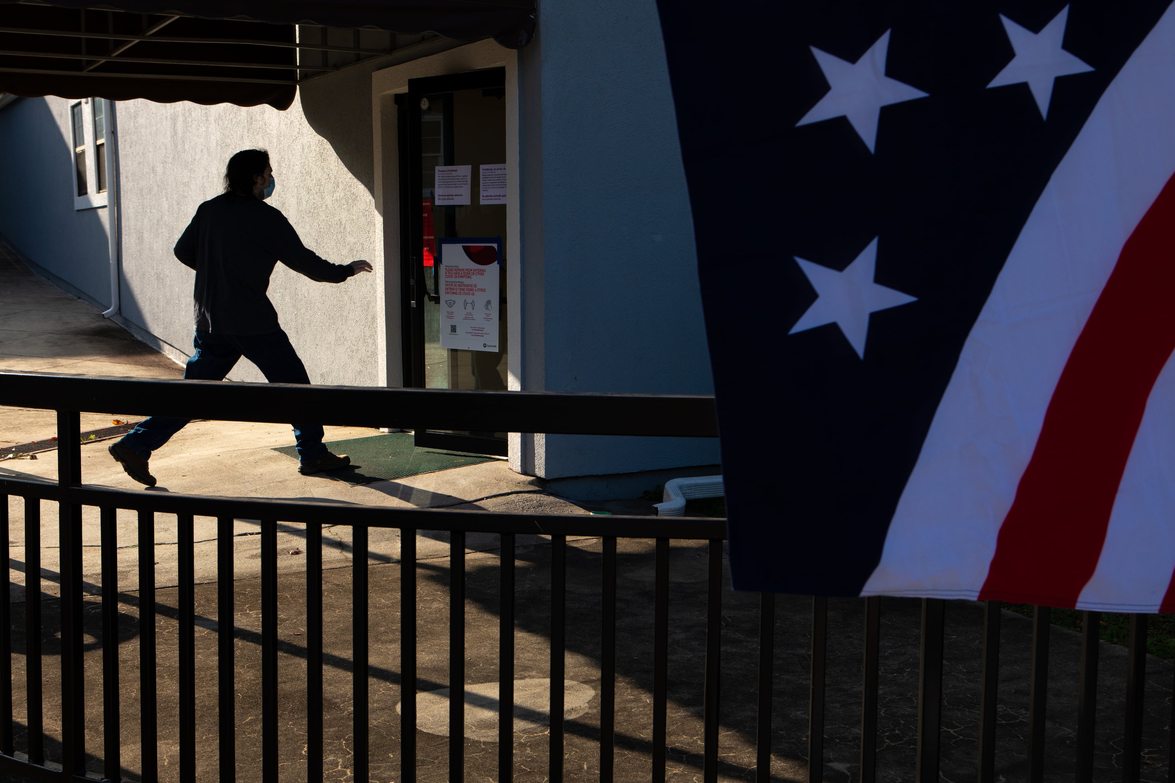 A man enters the polls at Landmark Church in Peachtree Corners, Ga., on Tuesday, Nov. 3, 2020. (Casey Sykes for The Atlanta-Journal Constitution)