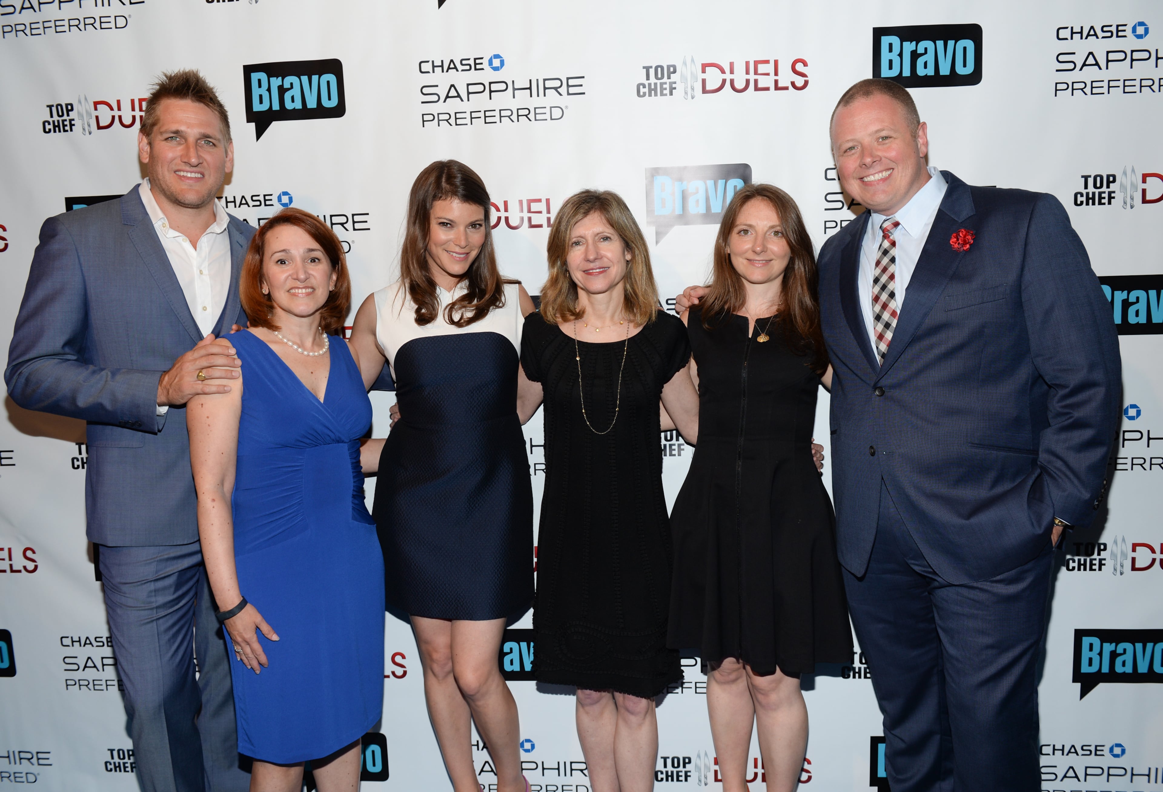 Host and judge Curtis Stone, left, Generel Manager Chase Sapphire Lisa Walker, judge Gail Simmons, Bravo and Oxygen Media president Frances Berwick, City Harvest director of marketing Julia Foster, Bravo senior vice president partnership marketing Jamie Cutburth attend the "Top Chef Duels" Premiere Tasting Event, hosted by Chase Sapphire Preferred and Bravo, at the Altman Building, on Monday, Aug. 4, 2014 in New York. (Photo by Evan Agostini/Invision for Chase Sapphire Preferred/AP Images)