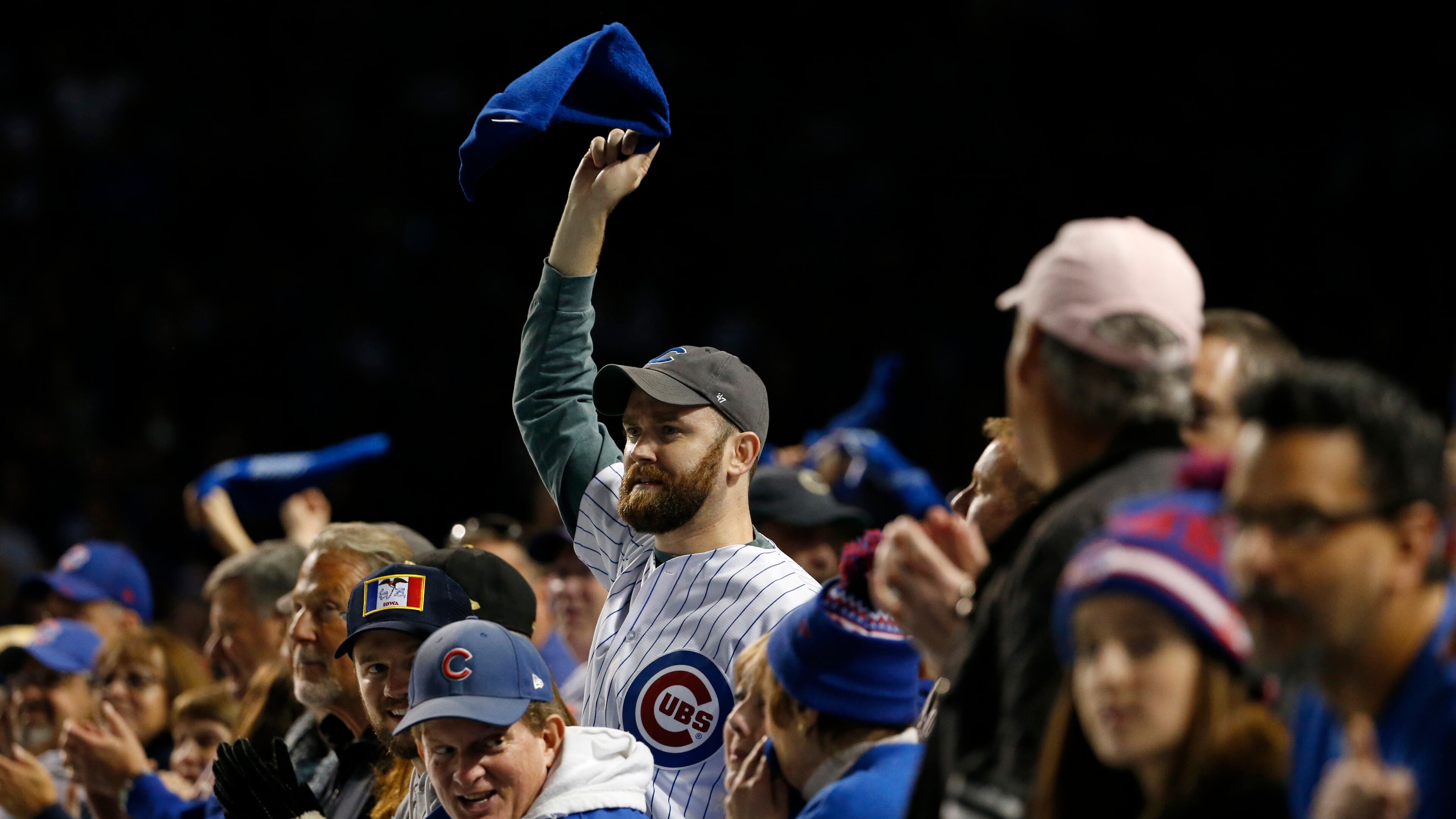 Chicago Cubs fans cheer during the ninth inning of Game 6 of the National League baseball championship series against the Los Angeles Dodgers, Saturday, Oct. 22, 2016, in Chicago. (AP Photo/Nam Y. Huh)