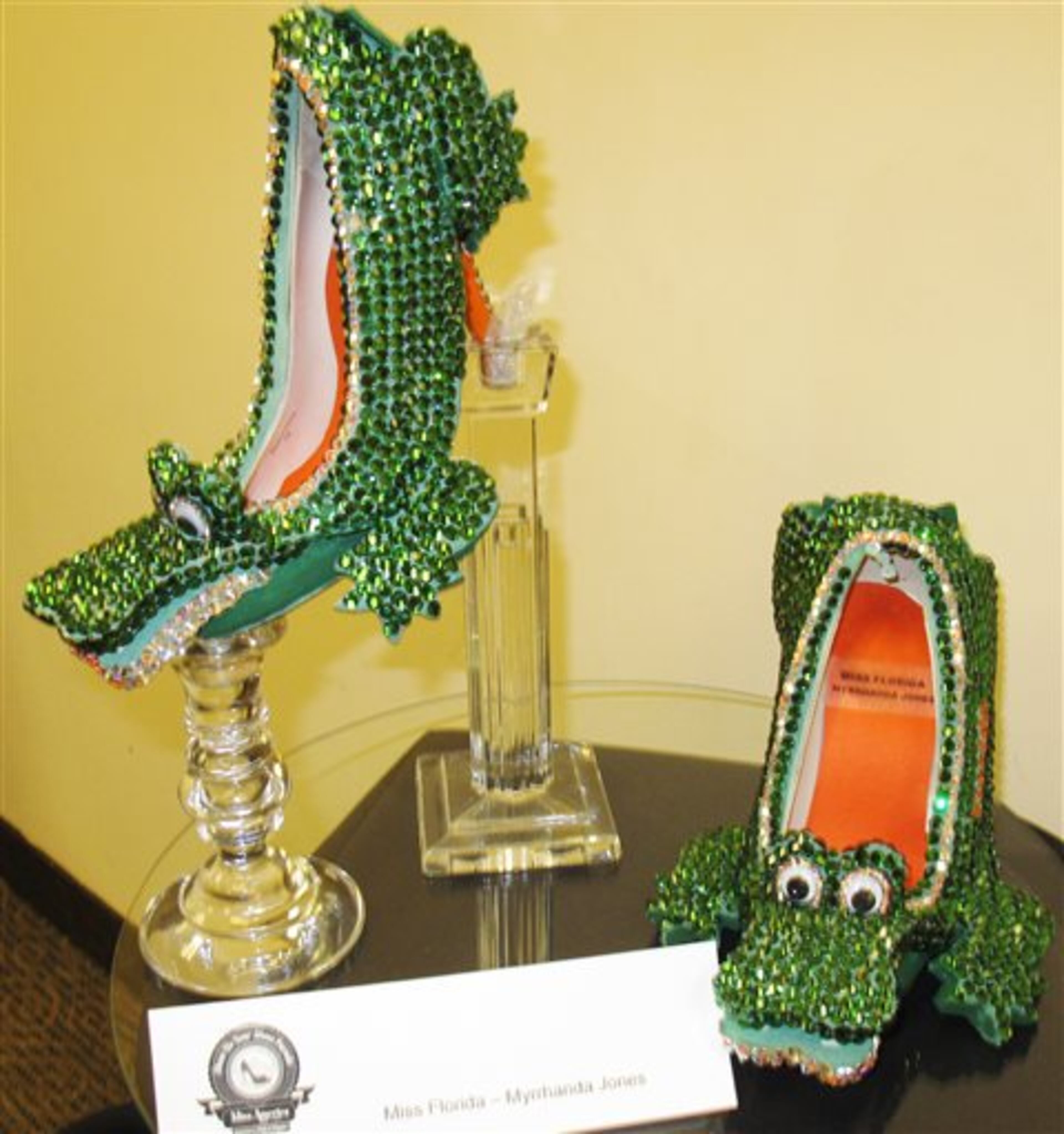 The shoes to be worn in the 2014 Miss America pageant's "show us your shoes" parade by Miss Florida, are displayed during a new conference on Tuesday, Sept. 10, 2013, in Atlantic City N.J. The preliminary competitions began Tuesday, which is back in Atlantic City after a six-year absence. (AP Photo/Wayne Parry)