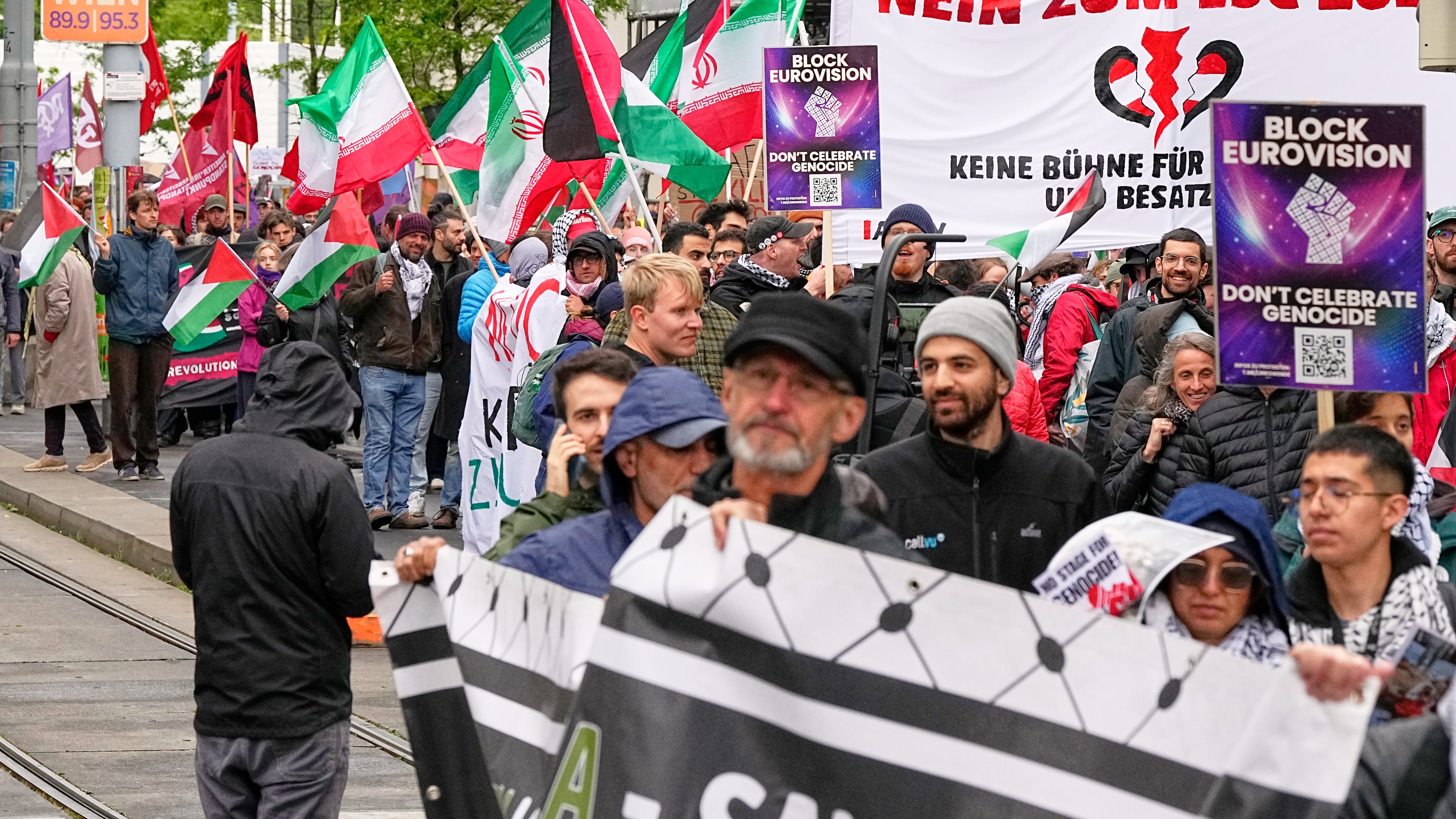 Demonstrators protest against Israel ahead of the Grand Final of the 70th Eurovision Song Contest in Vienna, Austria, Saturday, May 16, 2026. (AP Photo/Martin Meissner)