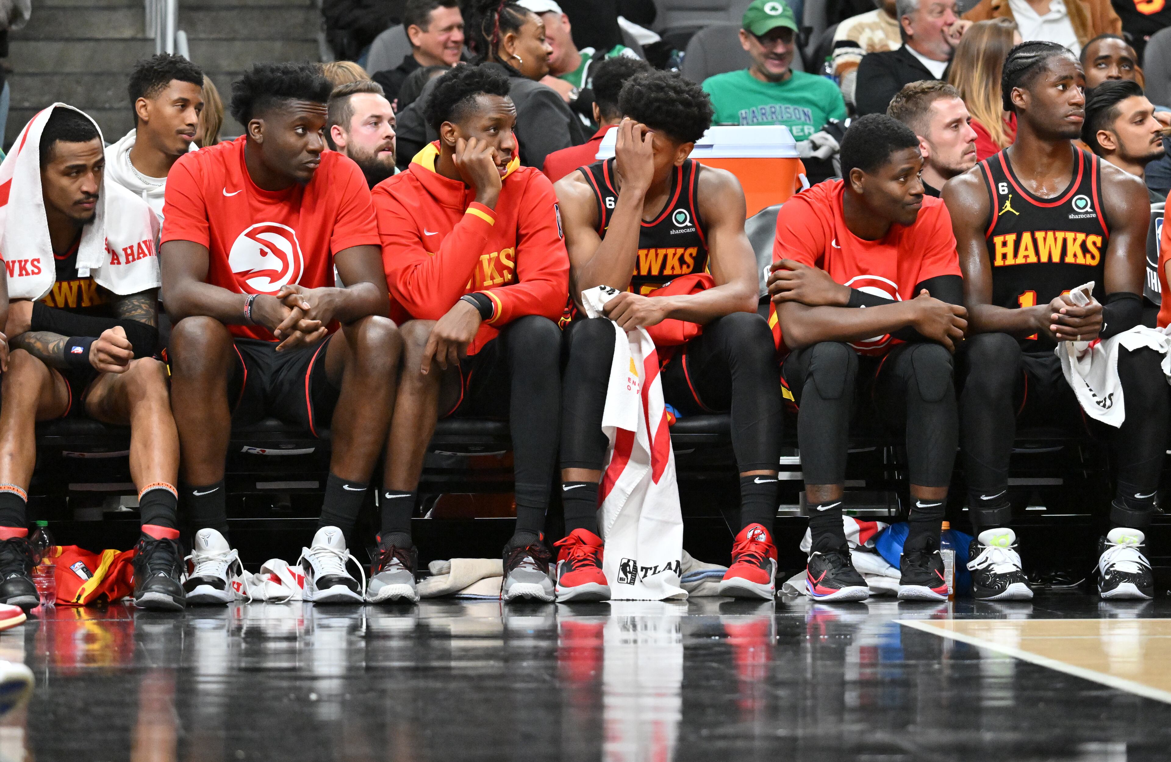 Hawks players watch the end of the fourth quarter in an NBA basketball game at State Farm Arena on Wednesday, November 16, 2022. The Celtics beat the Hawks 126-101. (Hyosub Shin / Hyosub.Shin@ajc.com)