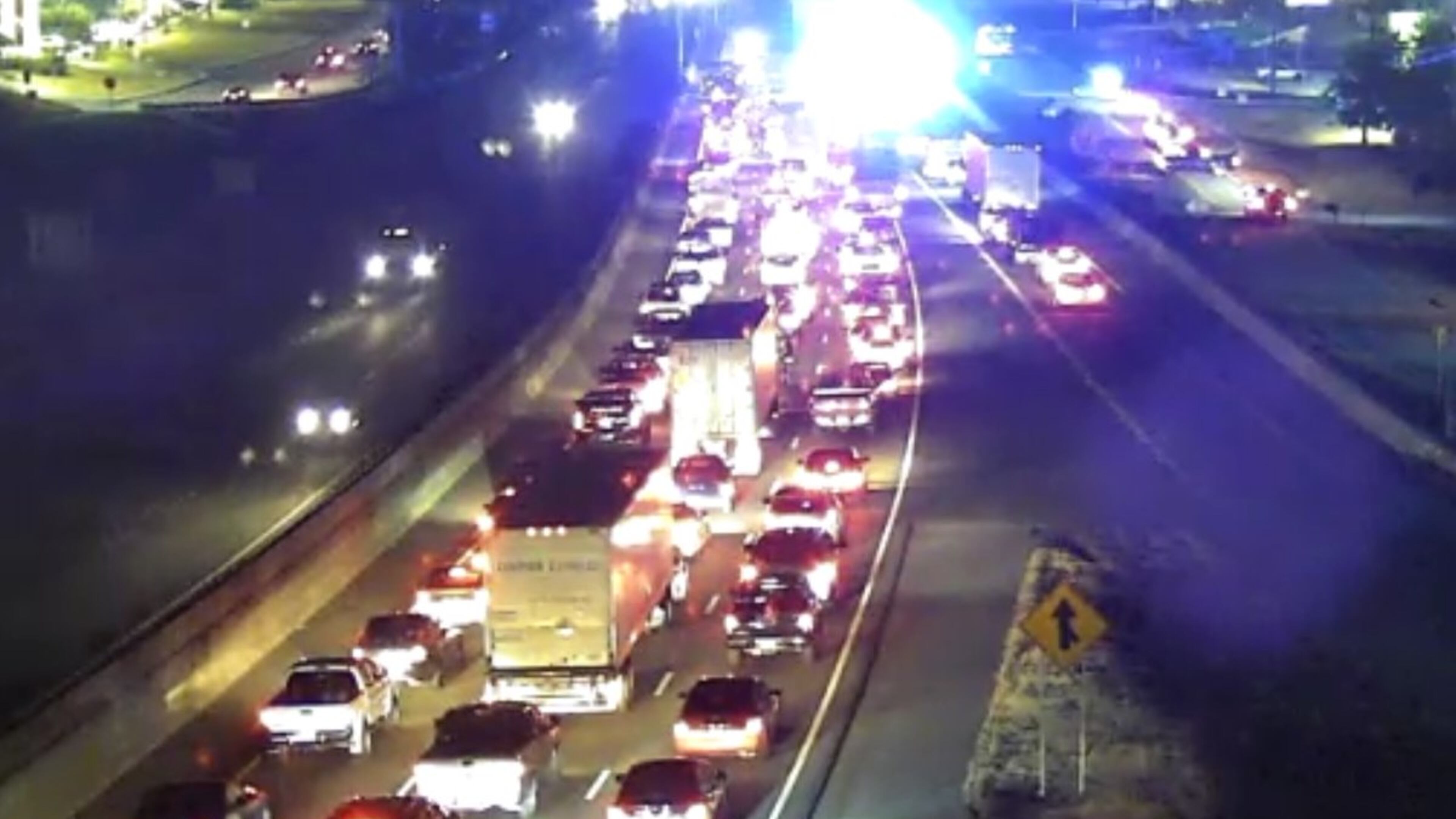 A stolen car caught fire and led to heavy westbound delays on I-20 at West Avenue in Rockdale County. (Credit: Channel 2 Action News)