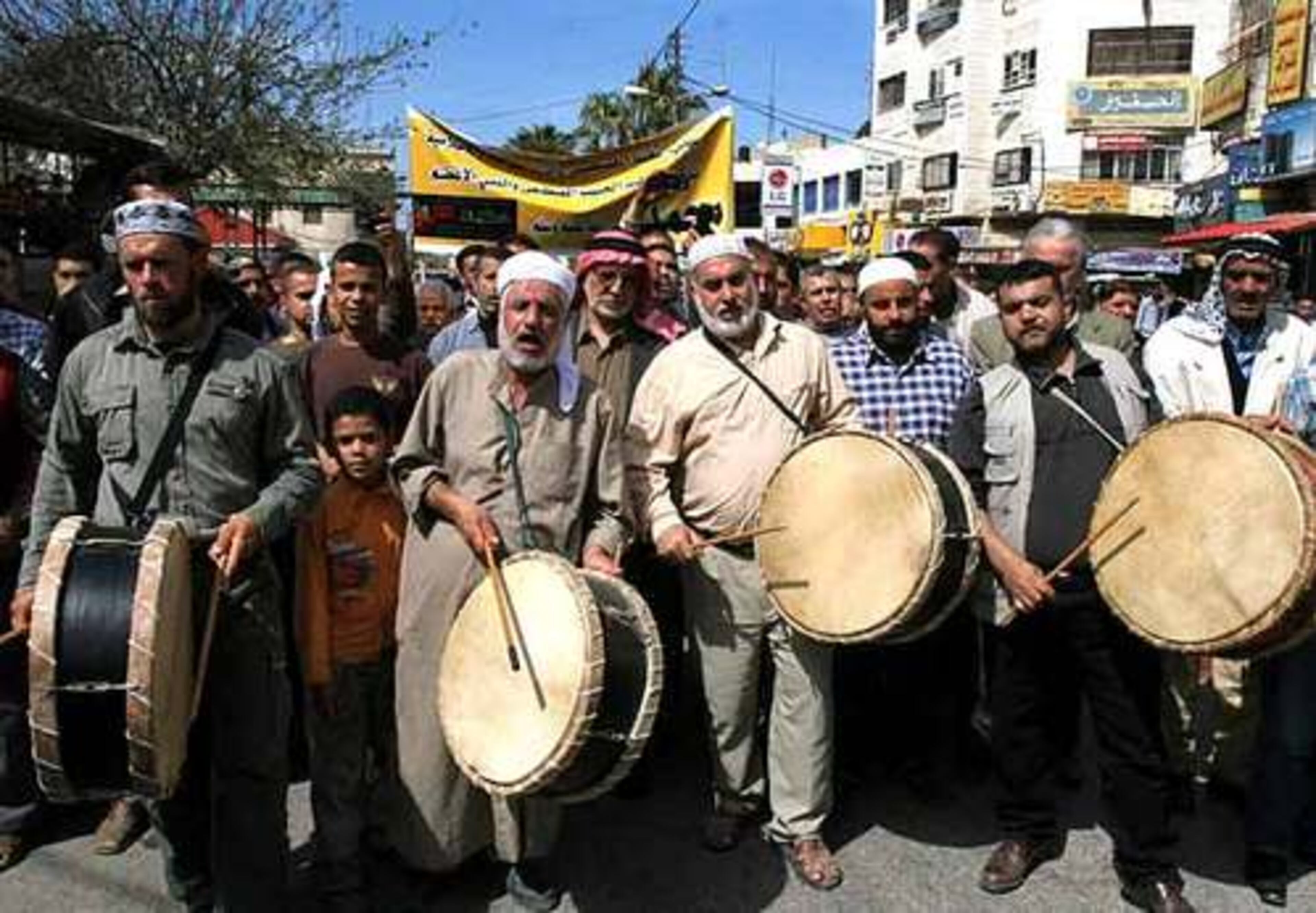 Palestinian Muslims celebrate the anniversary of Prophet Mohammed's birthday at a mosque in the West Bank town of Jenin, Thursday. Muslims celebrate Prophet Mohammad's birthday all over the world every year on 12th Rabi-ul-Awal month on the Islamic calendar with traditional festivities and religious fervor.