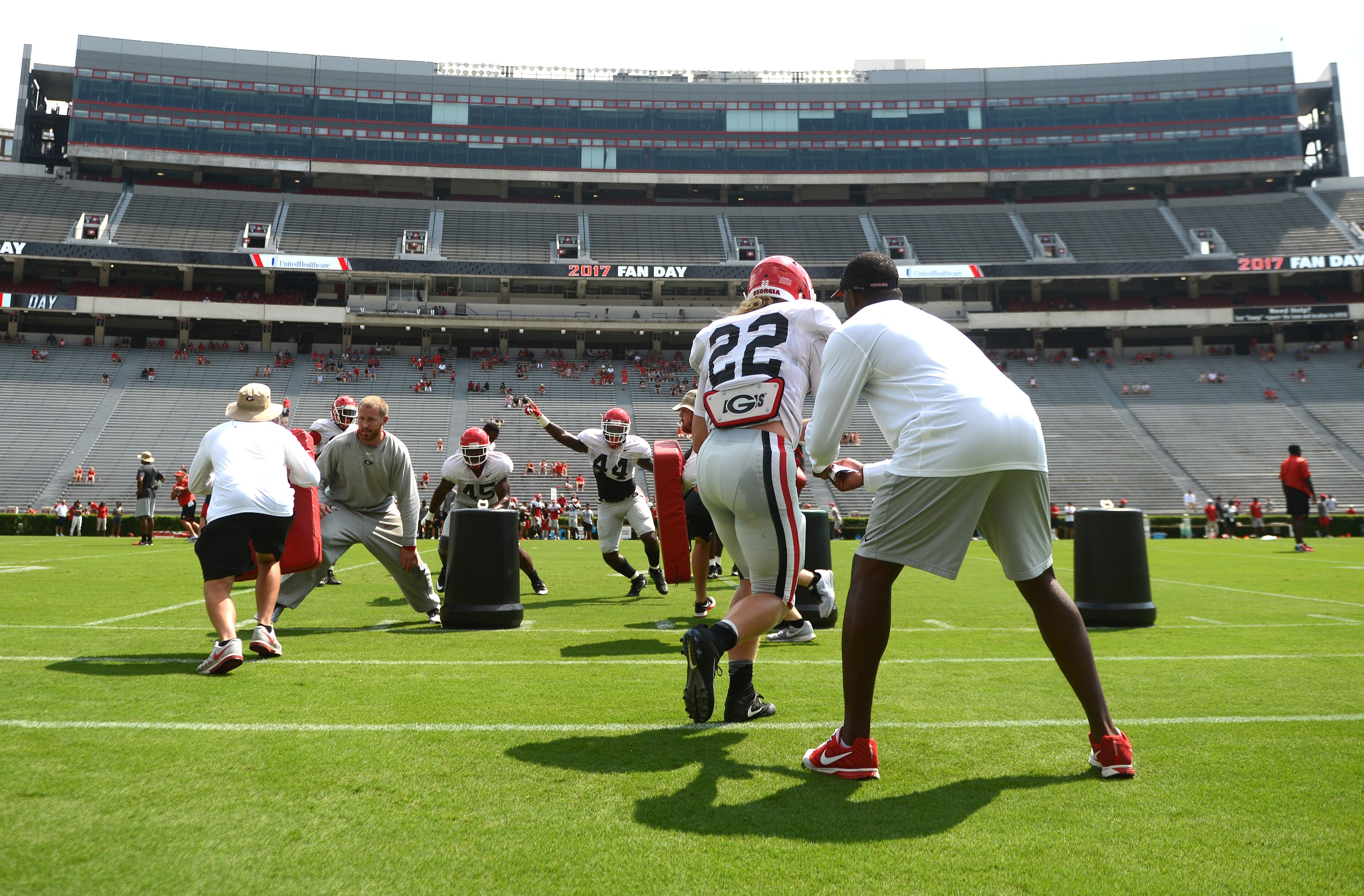 The Georgia inside line runs a few drills during the annual UGA Fan Day at Sanford Stadium on Saturday, Aug 5, 2017 in Athens, Ga.
(RICHARD HAMM)