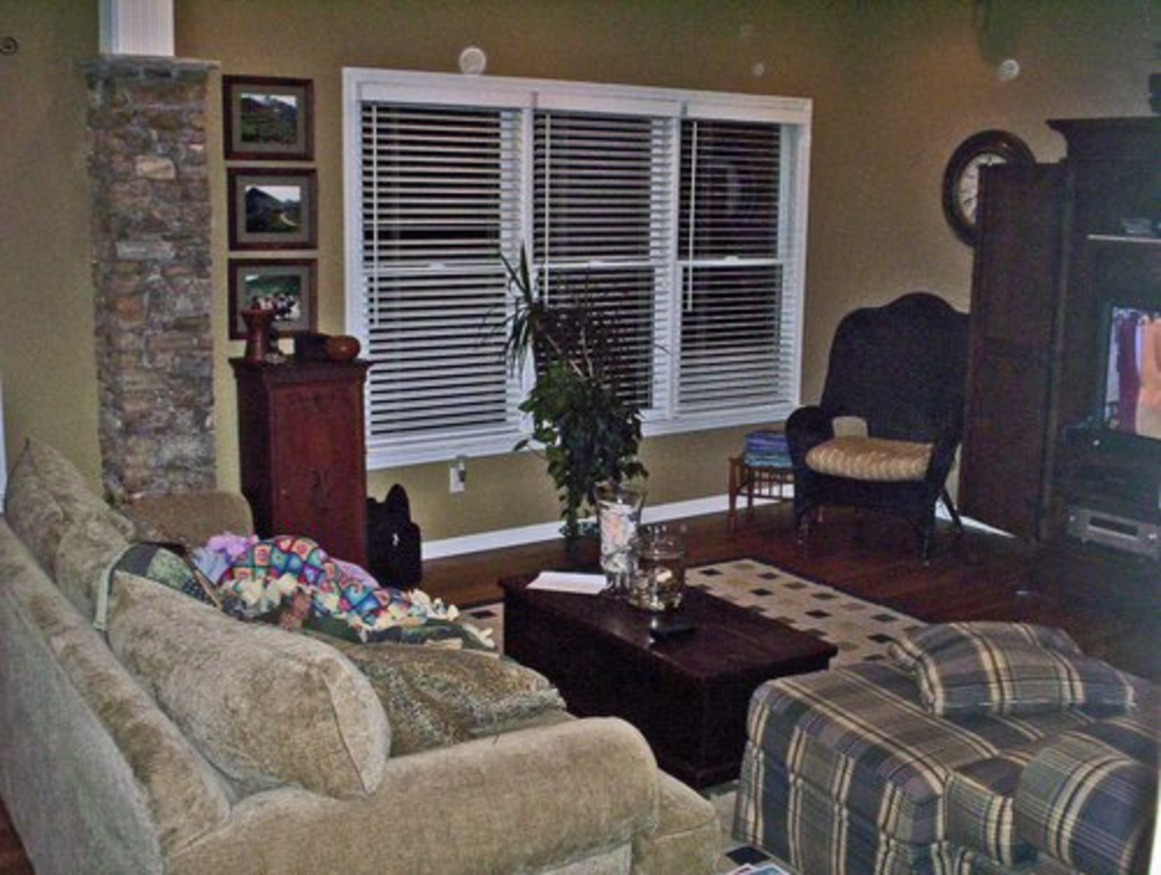 Over 75 percent of buyers see a house for the first time online, so quality listing photos are vital. That is where staging -- the art of preparing a house for sale -- comes in. According to Michelle Yackel, an accredited staging professional with Divine Redesigns, if buyers aren't wowed by the pictures, they won't come see the home. She shows how making a few changes can make a dramatic difference. This room began with oversized furniture that blocked buyers from entering the room.