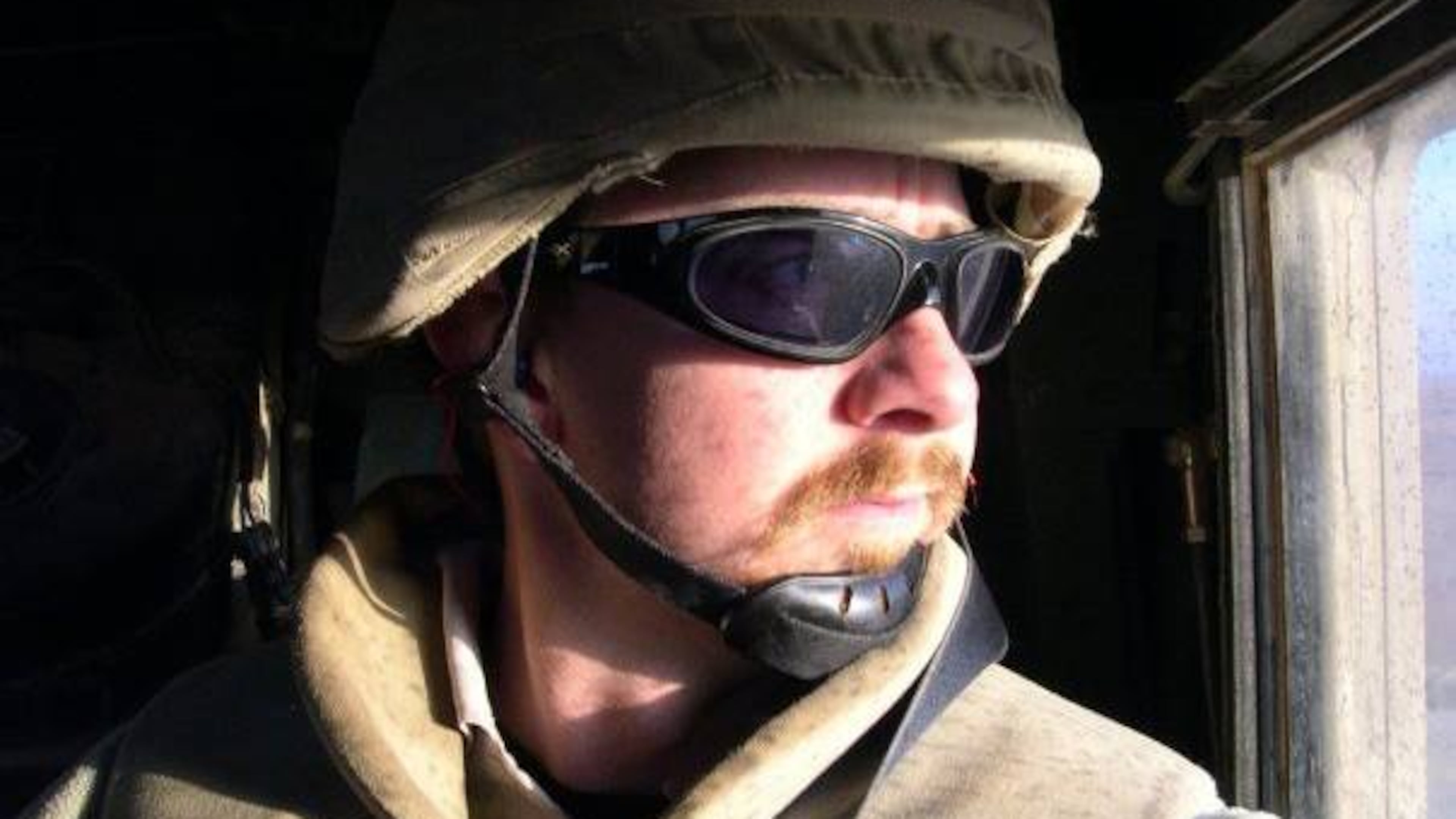 Journalist Jeremy Redmon embedded with U.S. troops three times to cover the Iraq War. In the process he came to recognize the physical, psychological and emotional toll the Vietnam War must have taken on his father. (Courtesy of Jeremy Redmon)