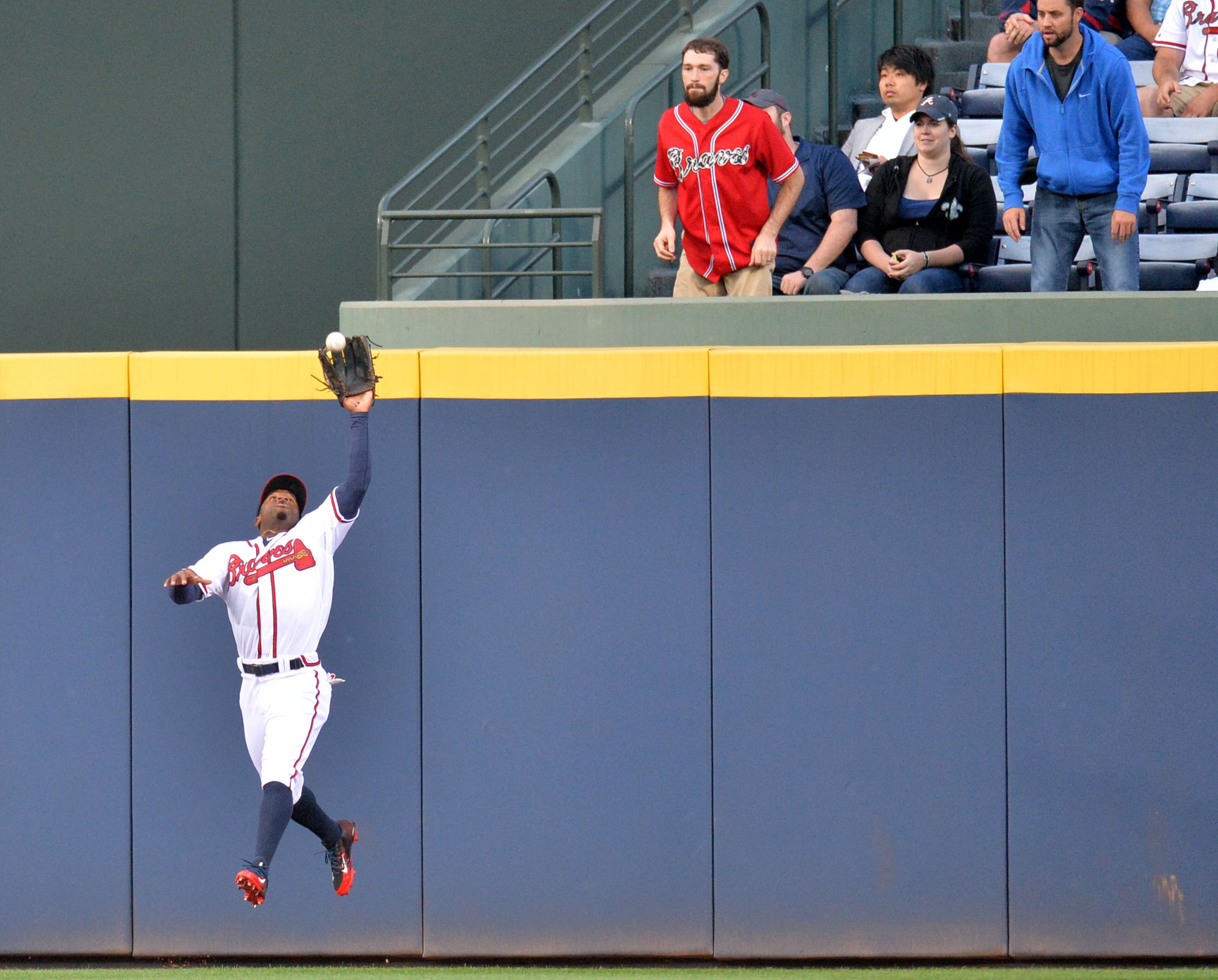 Number 26: Rising to the occasion -- Braves center fielder Eric Young Jr. catches a long drive on April 29. Photo by Hyosub Shin.