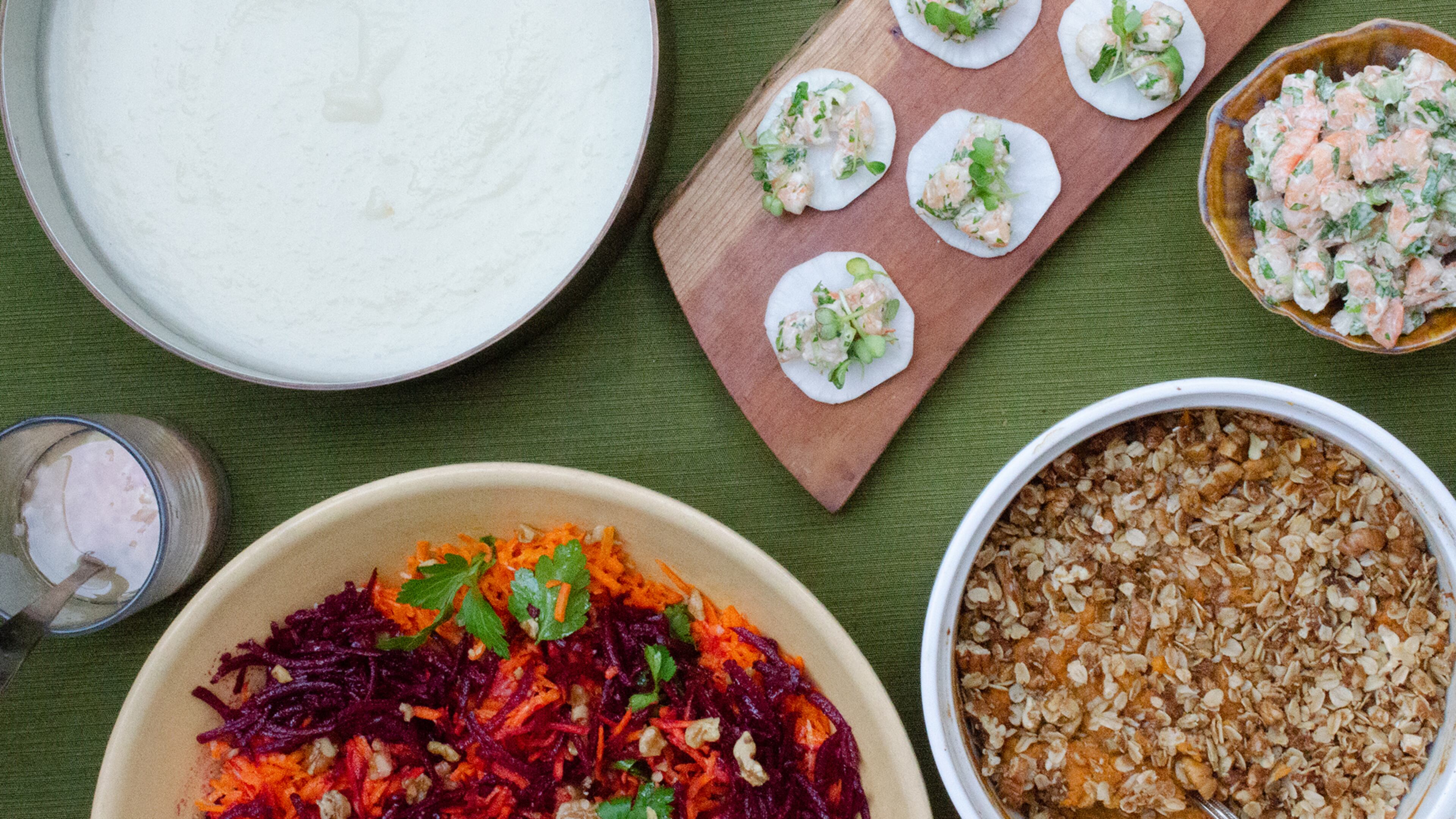 Shake up the root vegetable repertoire with recipes for (clockwise, from left) Turnip Soup with Chive Cream, Daikon “Crostini” with Shrimp Salad, Sweet Potato Crisp, and Carrot and Beet Salad with Lemon Vinaigrette. (Virginia Willis for The Atlanta Journal-Constitution)