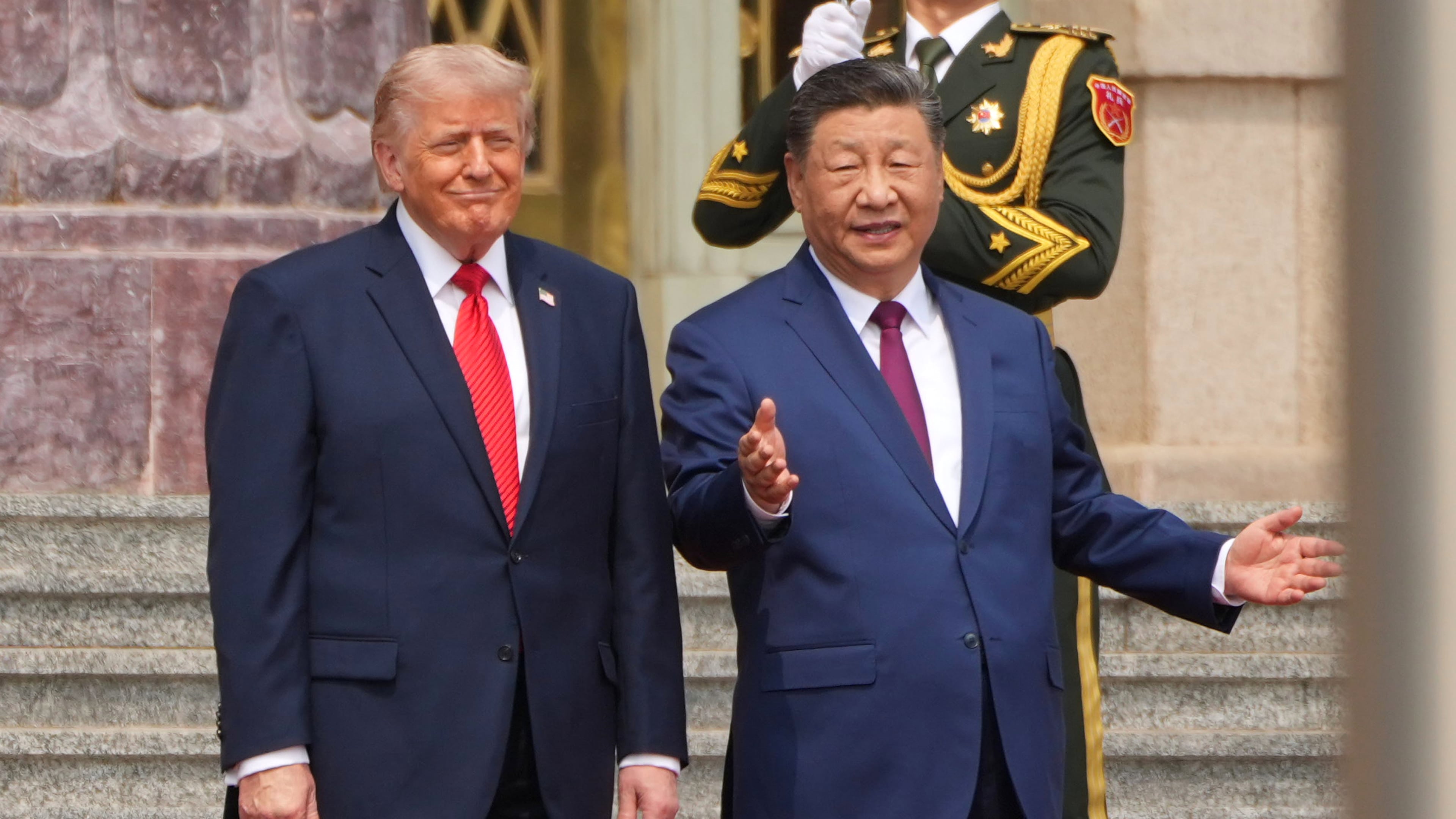FILE - President Donald Trump, left, participates in a welcome ceremony with China's President Xi Jinping at the Great Hall of the People, May 14, 2026, in Beijing. (AP Photo/Mark Schiefelbein, File)