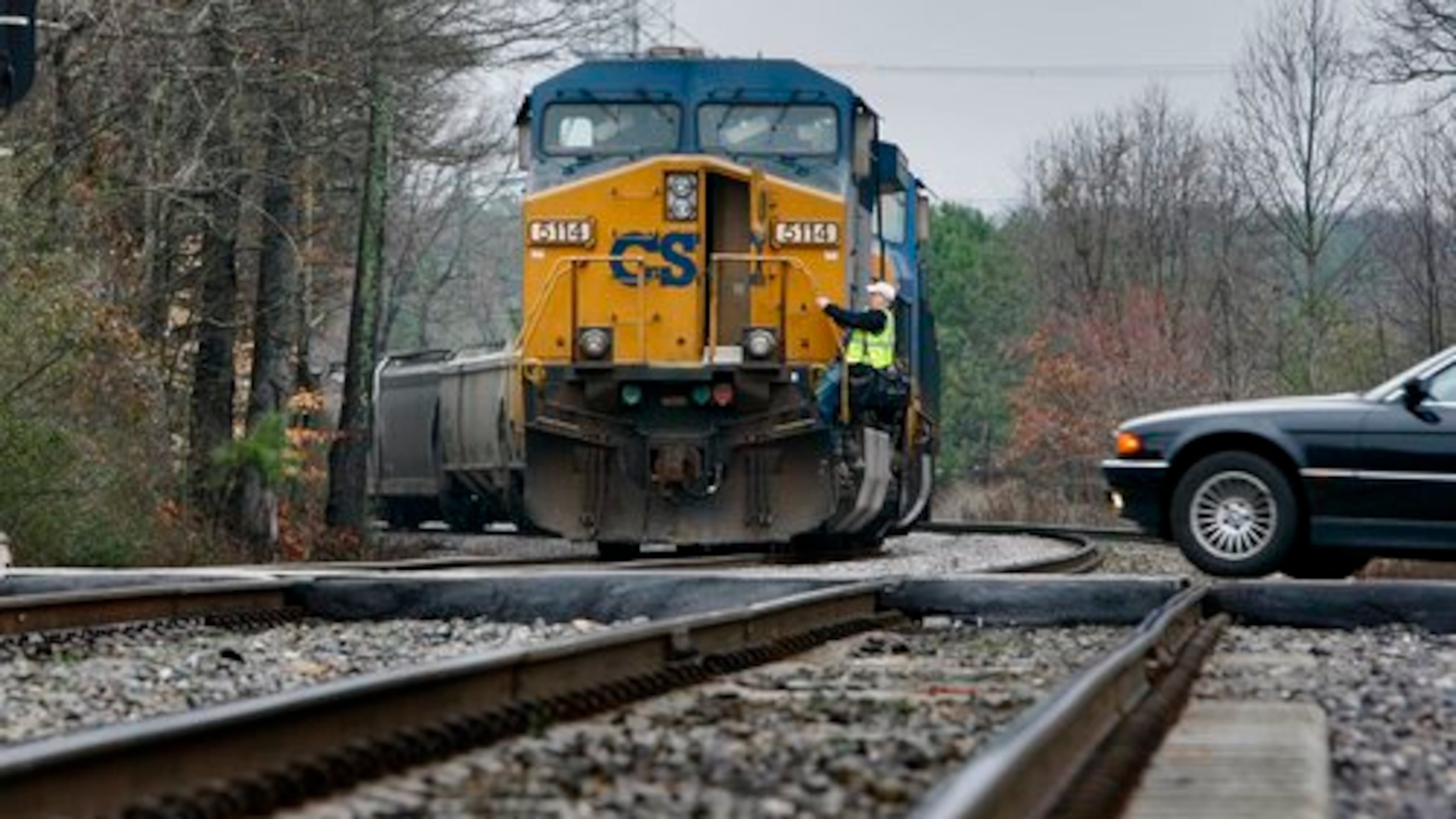 CSX train engineers arrive for work Friday morning. A freight train hit two teenagers near Kennesaw early Friday, March 12, 2010. The two young men were apparently lying near the tracks when they were hit around 1 a.m.