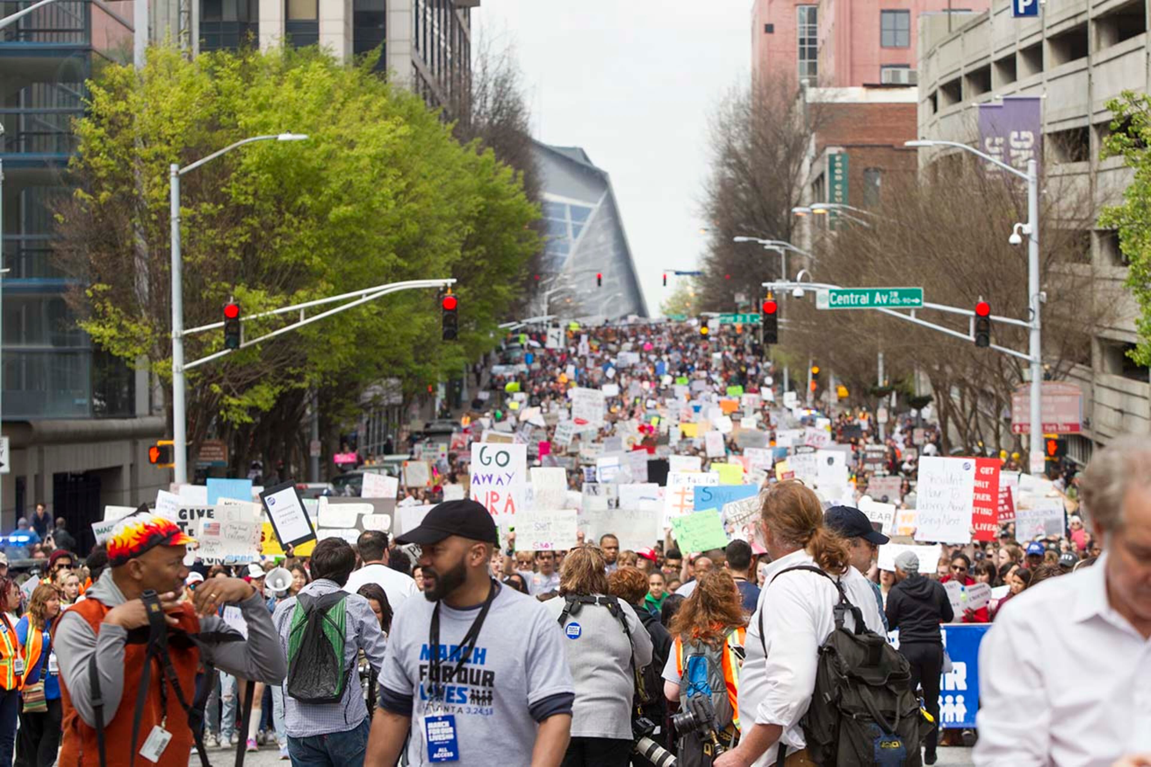 Thousands of people march through the streets of Downtown Atlanta during the March for our Lives event in Atlanta, Georgia, on Saturday, March 24, 2018. (REANN HUBER/REANN.HUBER@AJC.COM)