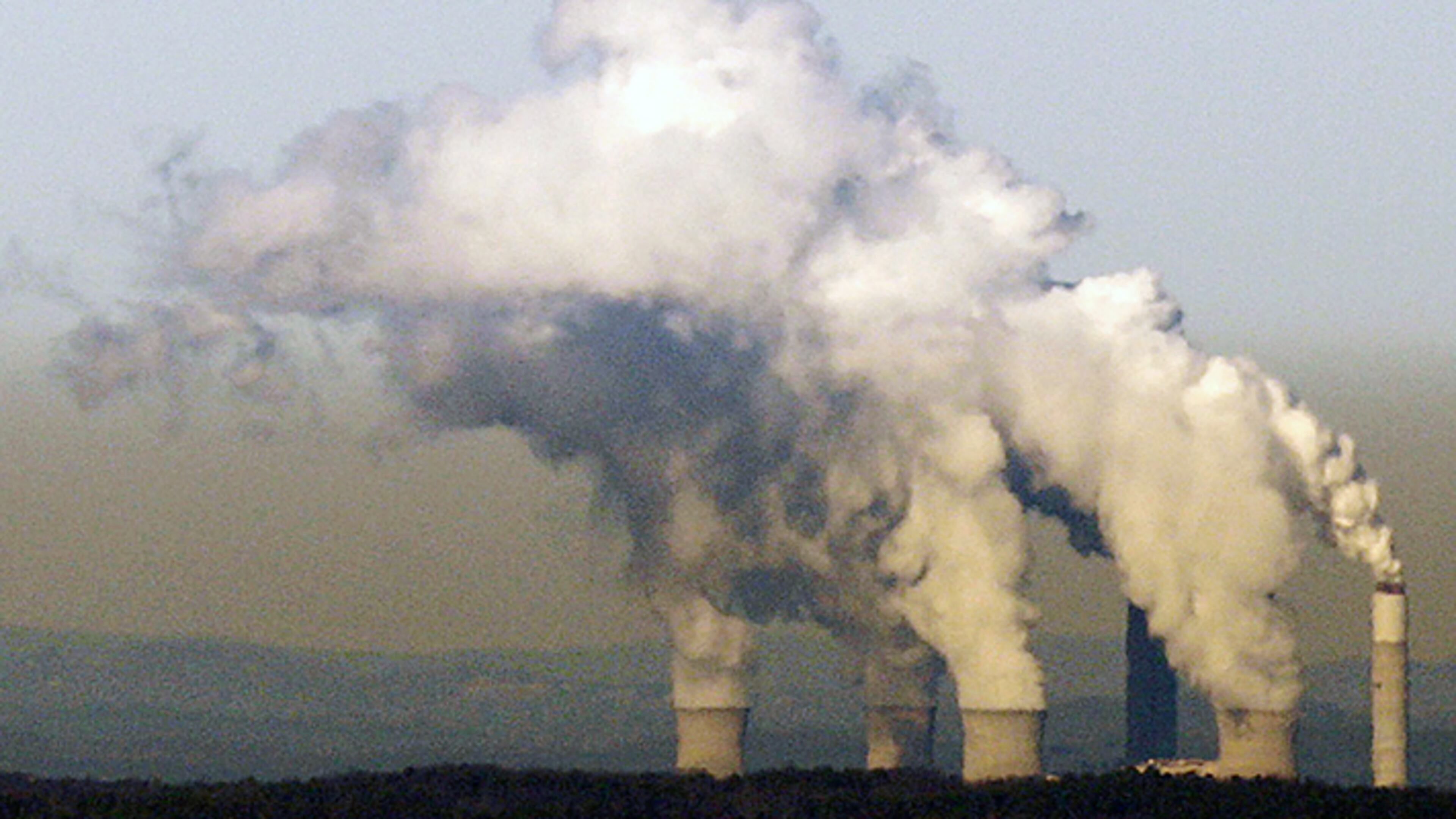 Water vapor from Georgia Power's Plant Bowen's cooling towers and scrubber stacks as seen from the top of Kennesaw Mountain, about 30 miles away.