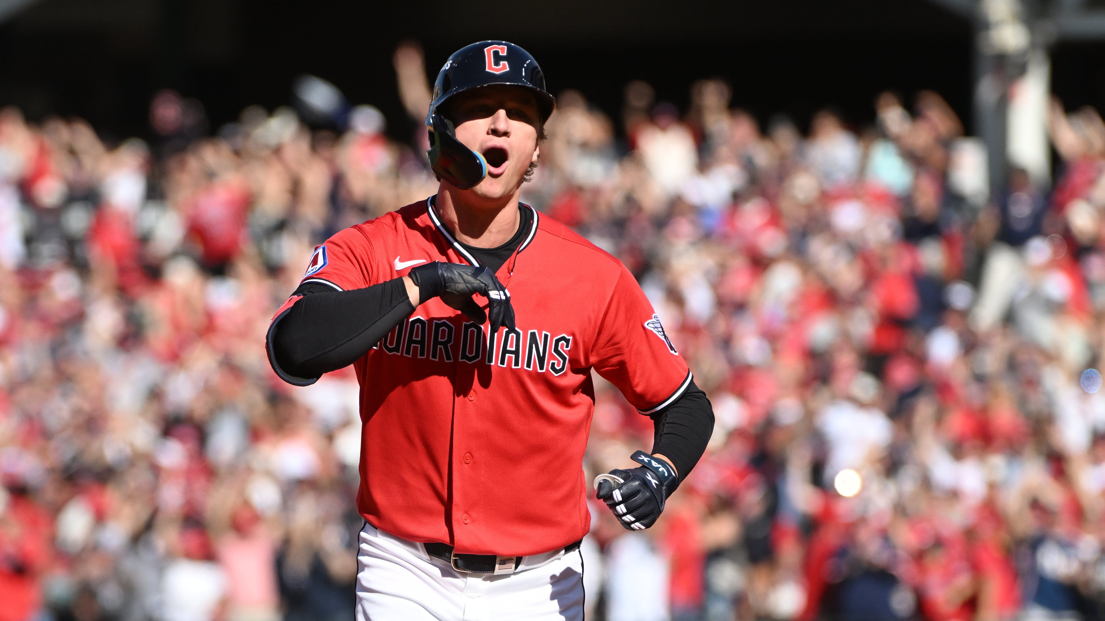 Cleveland Guardians' Petey Halpin celebrates after hitting a two-run home run during the fifth inning in Game 3 against the Tampa Bay Rays in baseball's American League Championship Series in Cleveland, Thursday, Oct. 15, 2026. (AP Photo/Phil Long)