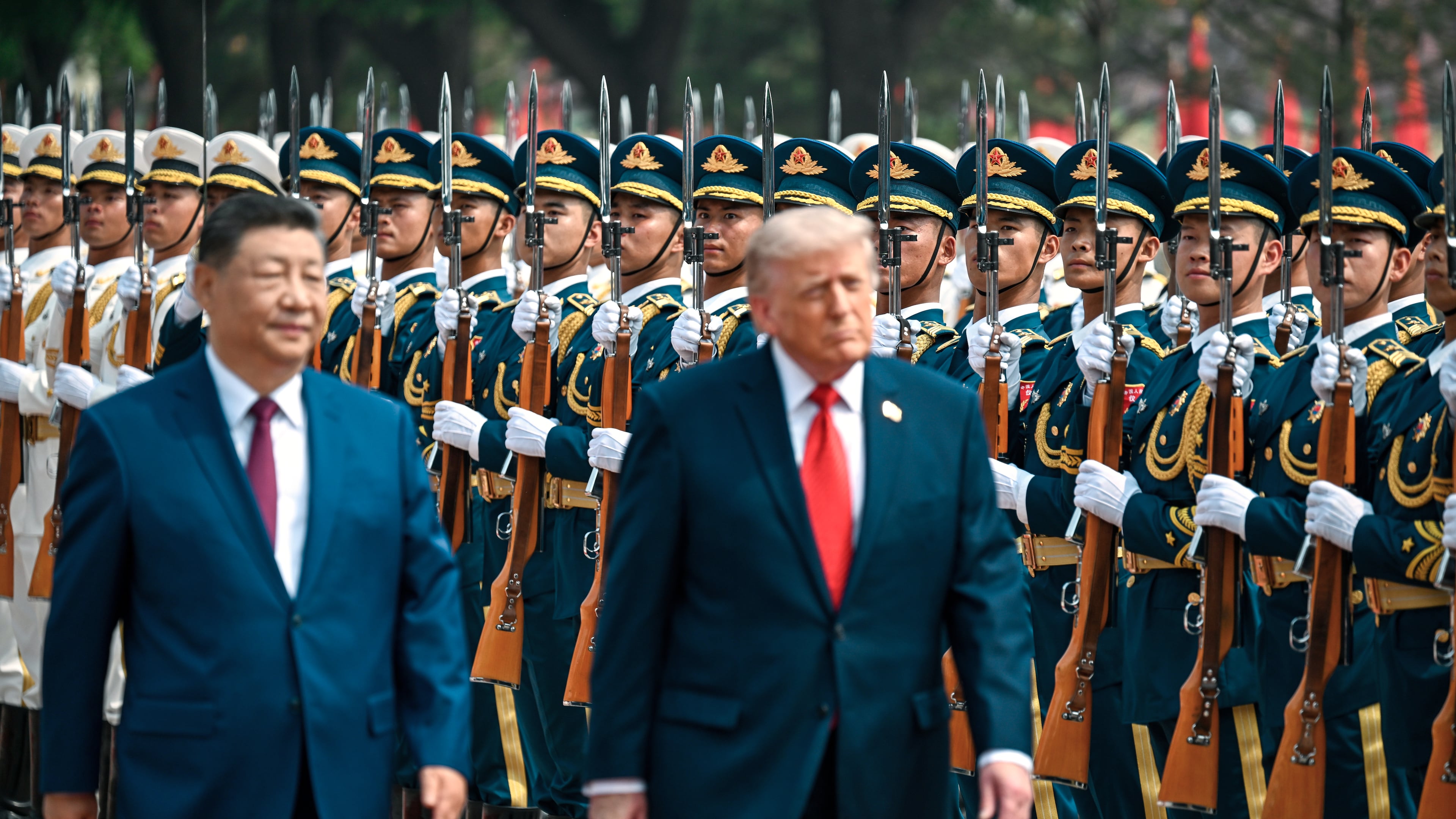 President Donald Trump reviews troops at the Great Hall of the People, Thursday, May 14, 2026, in Beijing. (Kenny Holston/The New York Times via AP, Pool)