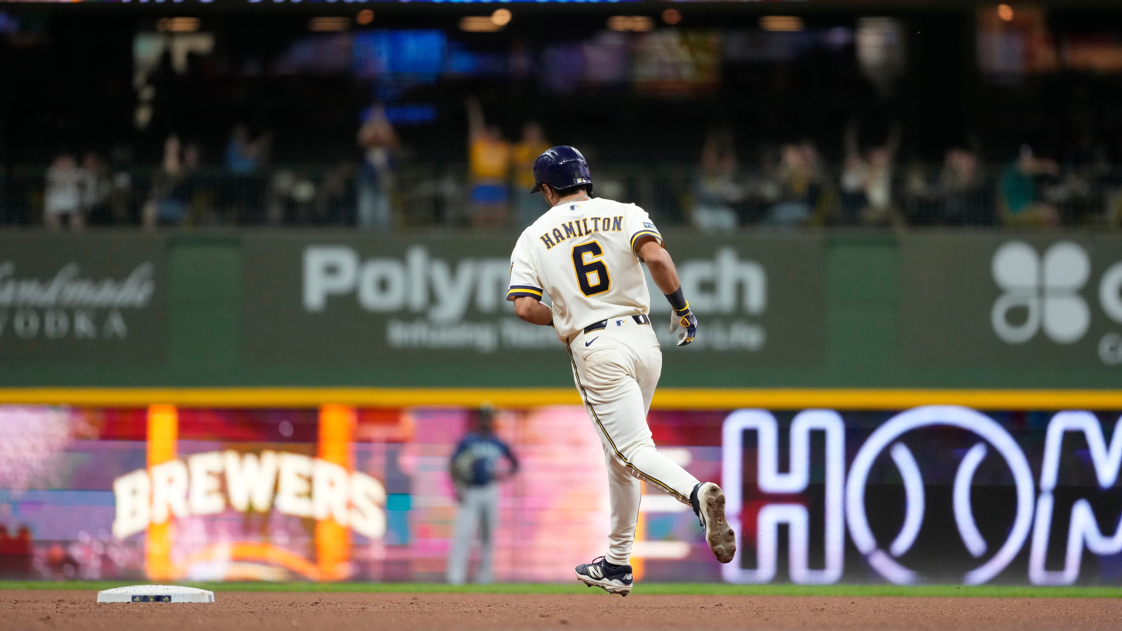 Milwaukee Brewers' David Hamilton rounds the bases after hitting a three-run home run during the sixth inning of a baseball game against the Seattle Mariners, Tuesday, Aug. 18, 2026, in Milwaukee. (AP Photo/Aaron Gash)