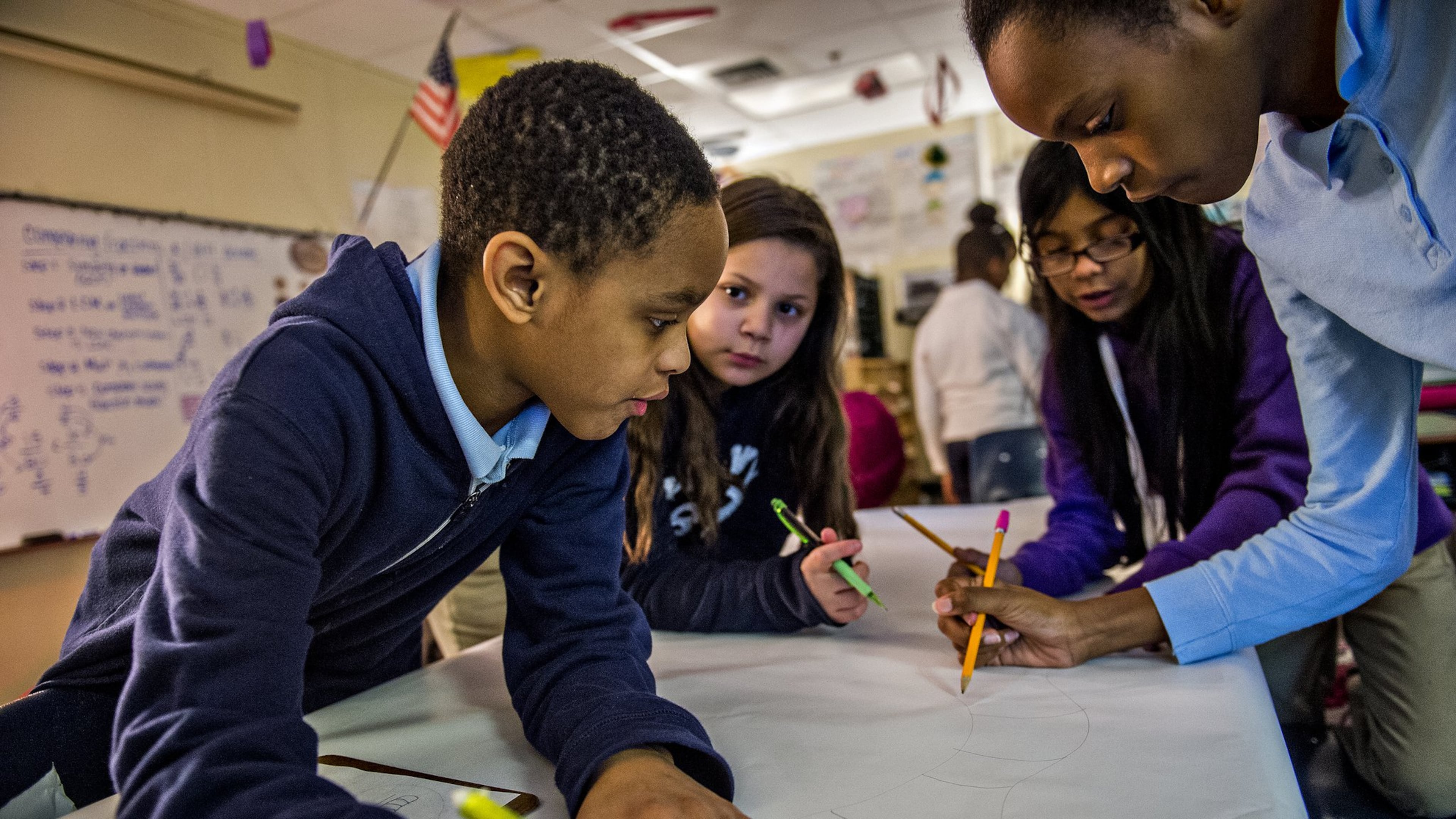 Antar Green (left), Brianna Espinoza, Kathleen Alfaro and Nia Murchison work together to draw a bug character during class at Powder Springs Elementary School. In recent years, school leaders used the acronym STEM (Science, Technology, Engineering & Math) to stress the importance of those subjects. Many now use STEAM to include the arts. Schools are integrating arts into how they teach other subjects. JONATHAN PHILLIPS / SPECIAL