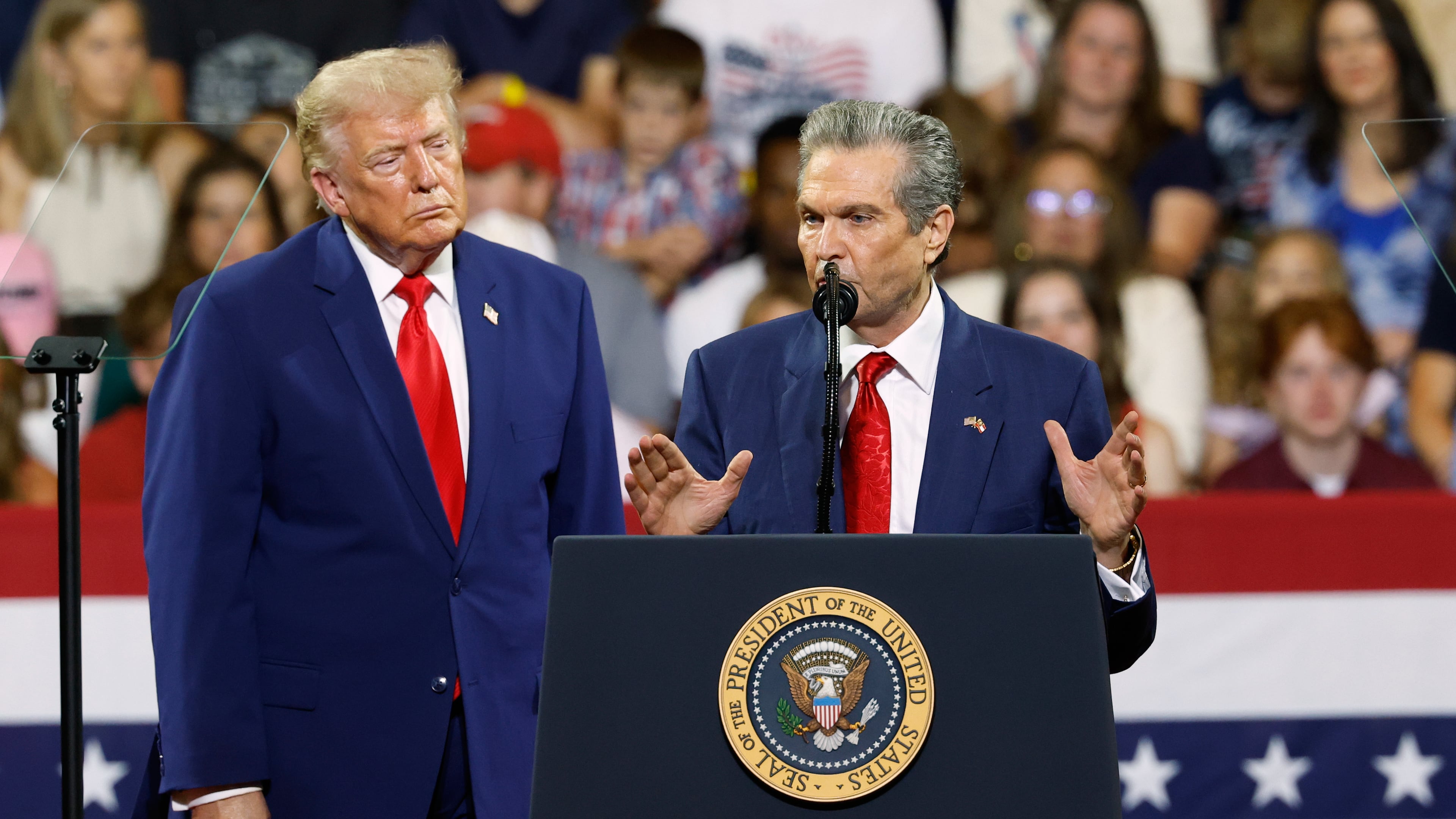President Donald Trump looks on as Georgia Republican gubernatorial candidate Rick Jackson speaks during a rally at Wheeler High School in Marietta, Ga., Wednesday, July 22, 2026. (Erik S. Lesser/AP)