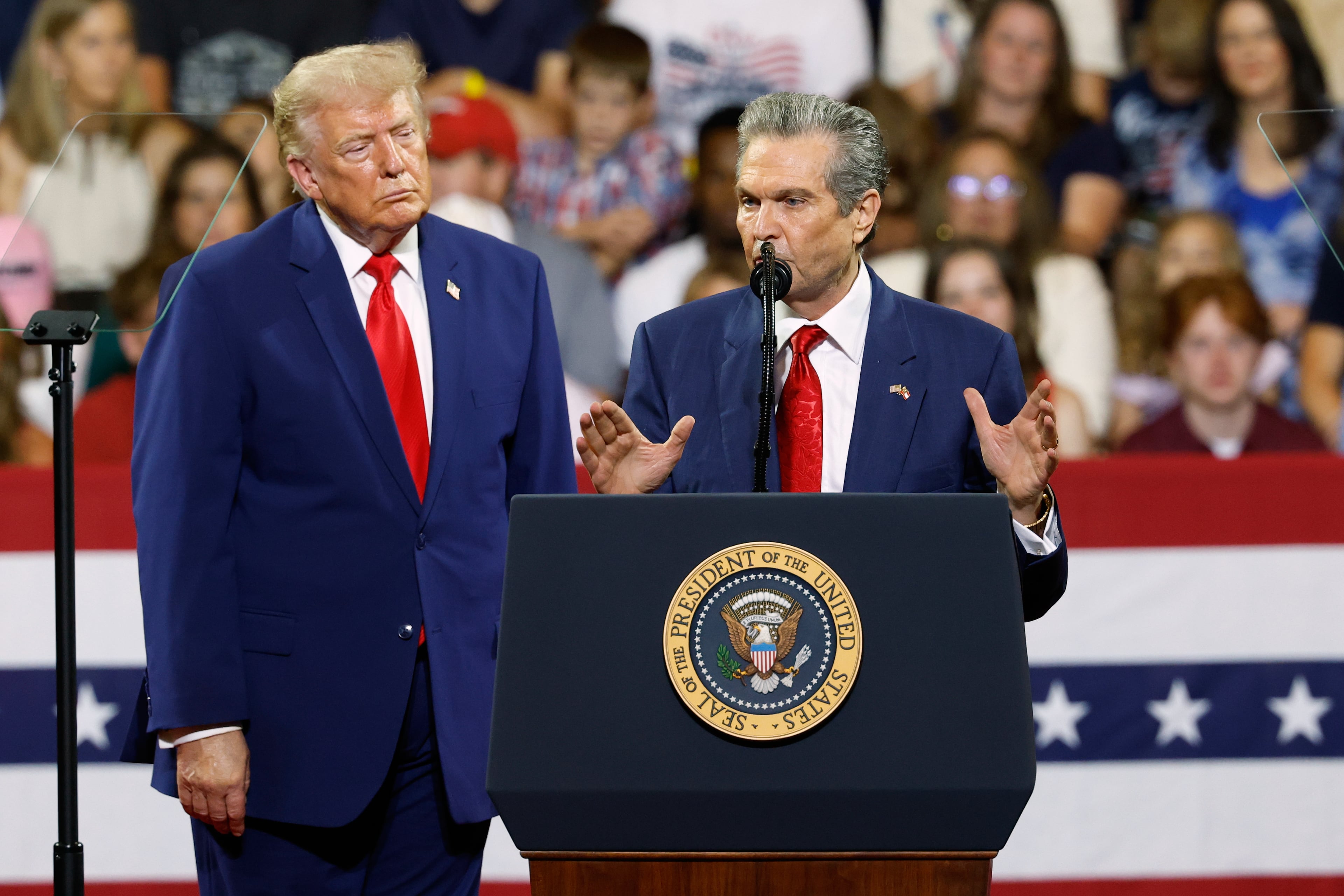 President Donald Trump looks on as Georgia Republican gubernatorial candidate Rick Jackson speaks during a rally at Wheeler High School in Marietta, Ga., Wednesday, July 22, 2026. (Erik S. Lesser/AP)