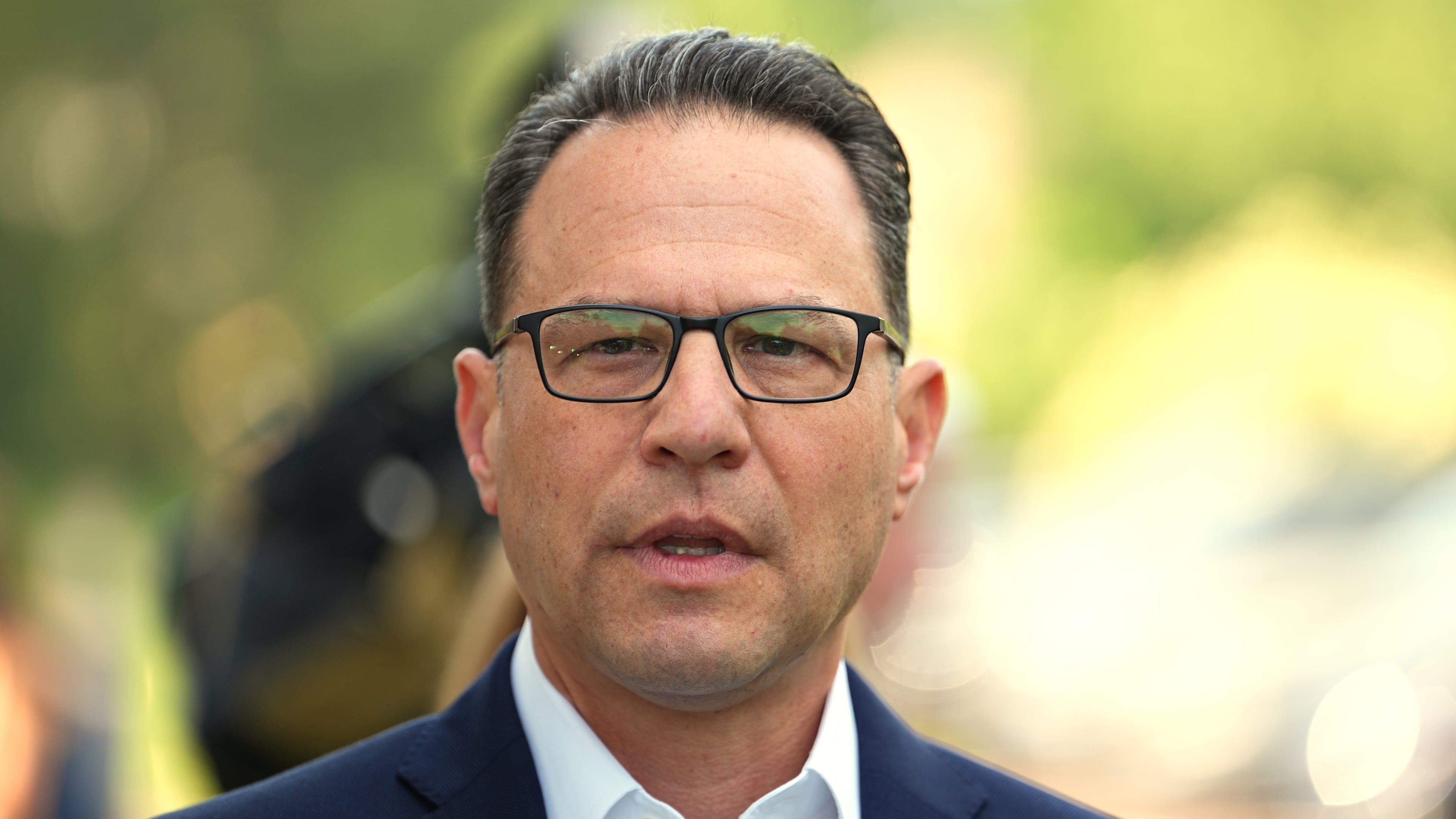 Pennsylvania Gov. Josh Shapiro speaks with members of the media outside his polling place in Rydal, Pa., Tuesday, May 19, 2026. (AP Photo/Matt Rourke)