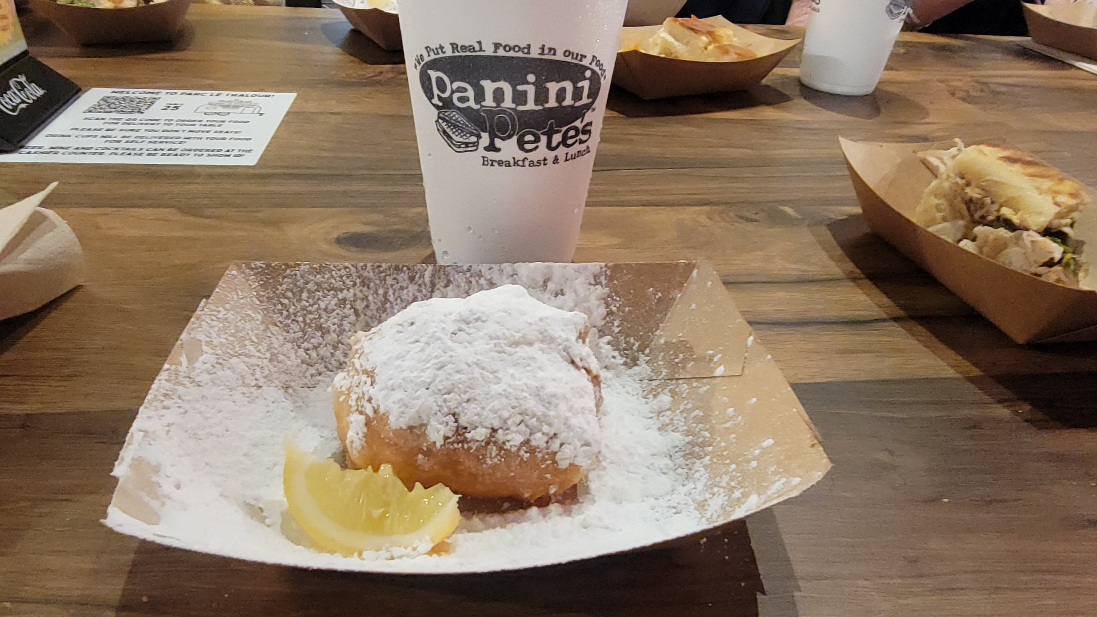 At Panini Pete's in Mobile, Alabama, beignets are served with a slice of lemon. (Courtesy of Tracey Teo)