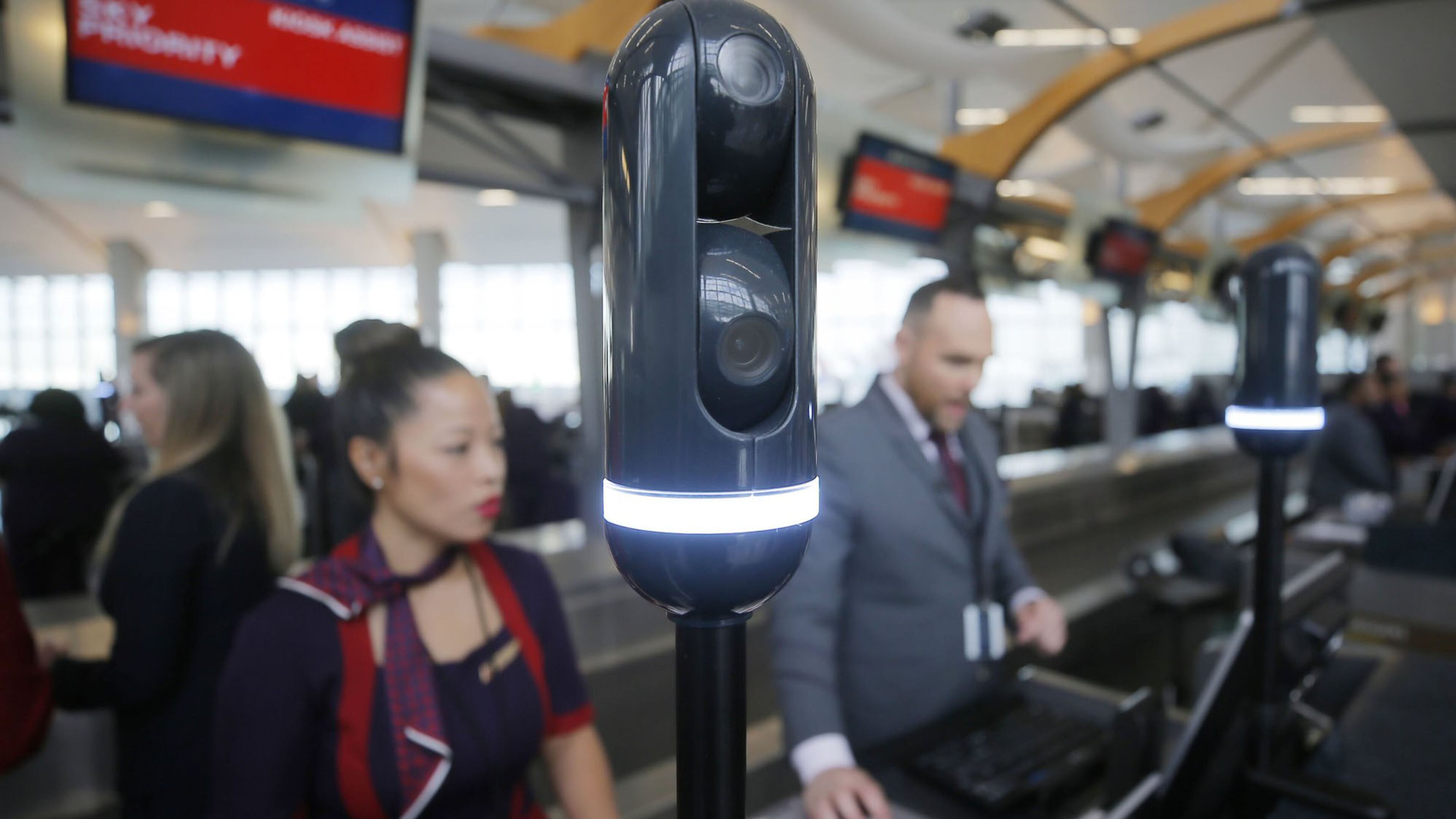 Cameras mounted on poles at the check-in counter scan travelers as they approach so the agent can have your flight info pulled up when you reach the counter. BOB ANDRES / BANDRES@AJC.COM