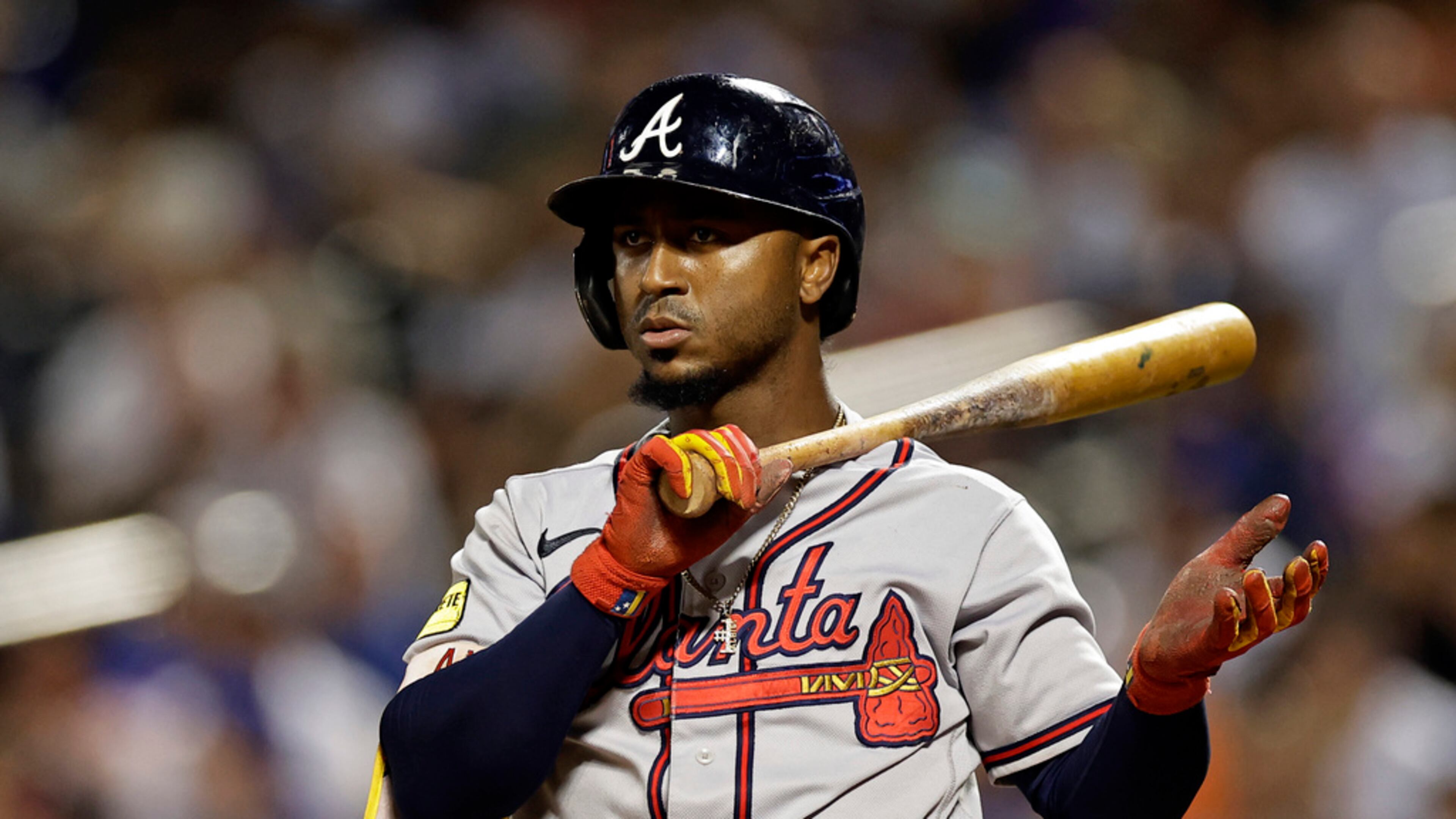 Atlanta Braves' Ozzie Albies (1) reacts against the New York Mets during the fifth inning of a baseball game on Sunday, Aug. 13, 2023, in New York. (AP Photo/Adam Hunger)