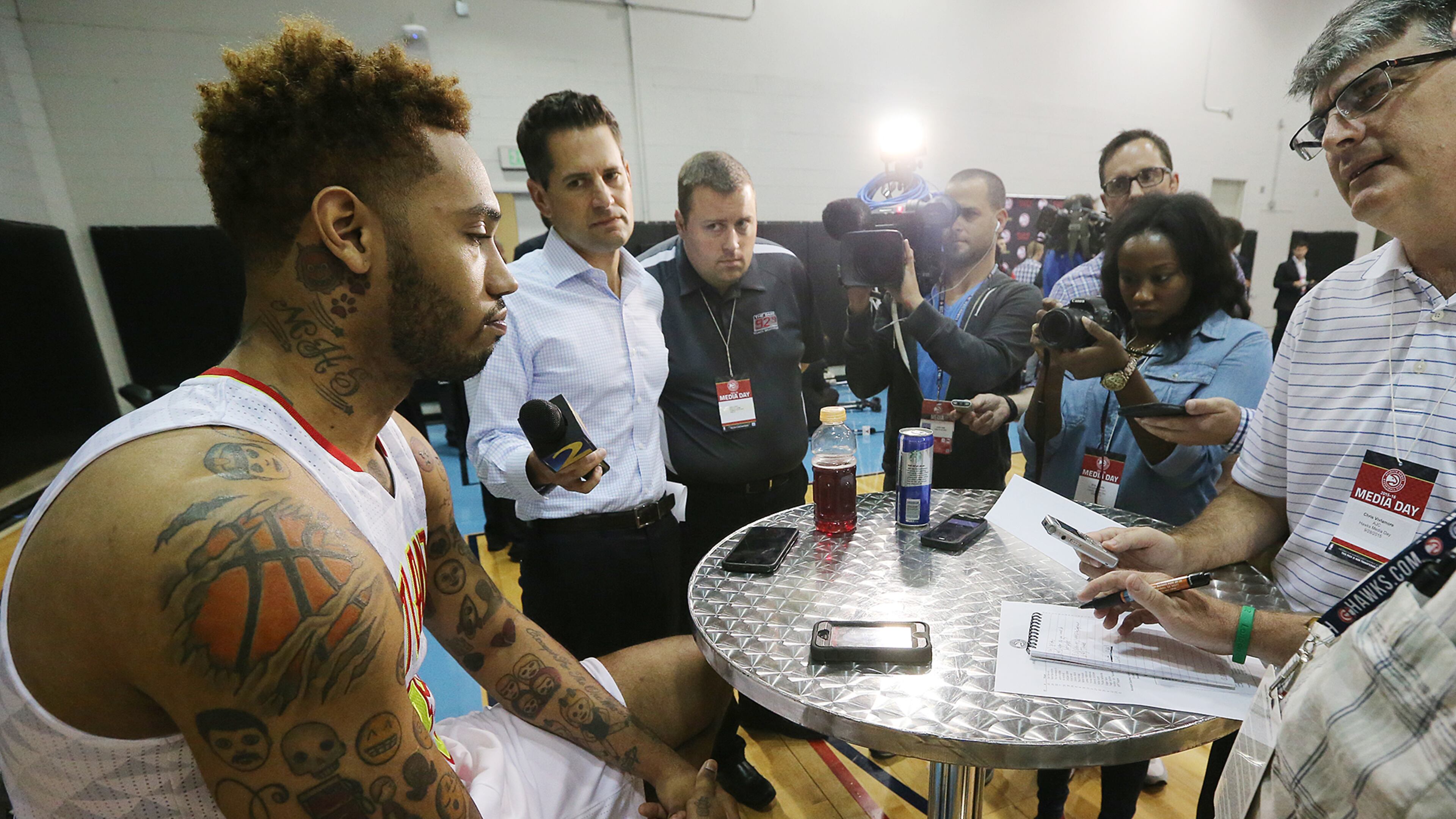 Hawks forward MIke Scott, who was arrested on felony drug charges earlier this year, is surrounded by news media with questions during the team's annual Media Day at the Philips Arena Practice Court on Monday, Sept. 28, 2015, in Atlanta.