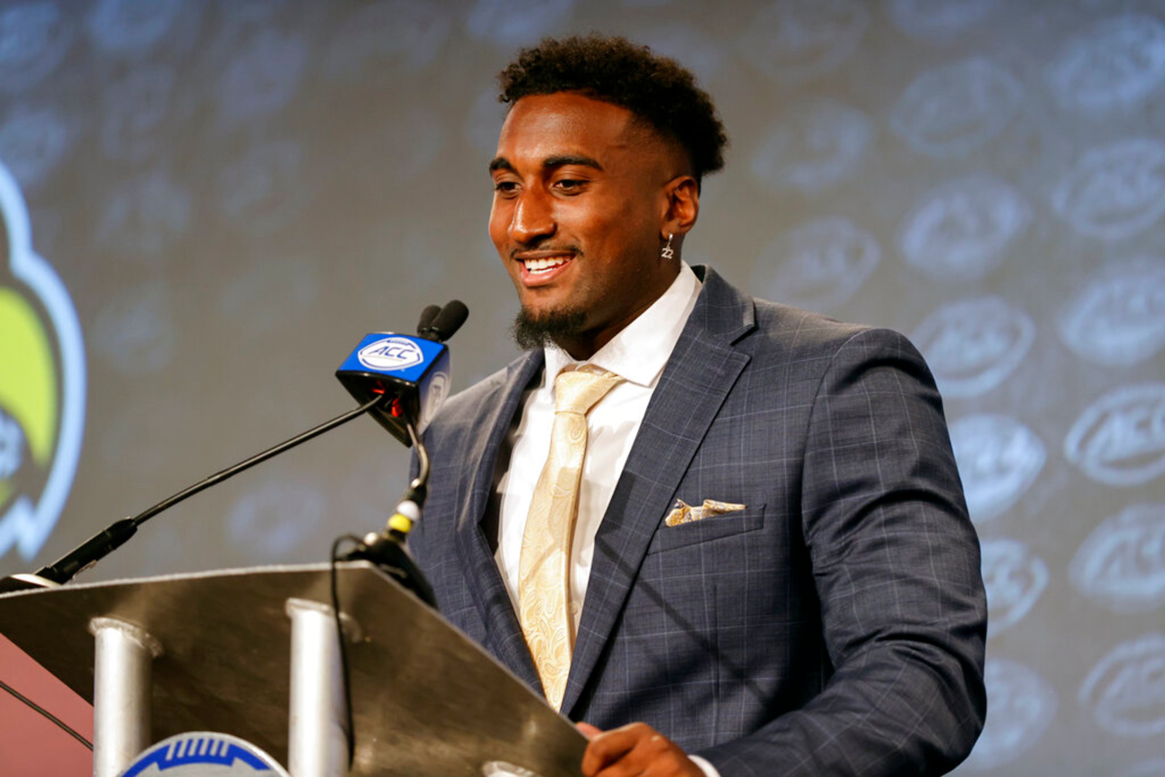 Louisville linebacker Yasir Abdullah answers a question at the NCAA college football Atlantic Coast Conference Media Days in Charlotte, N.C., Wednesday, July 20, 2022. (AP Photo/Nell Redmond)
