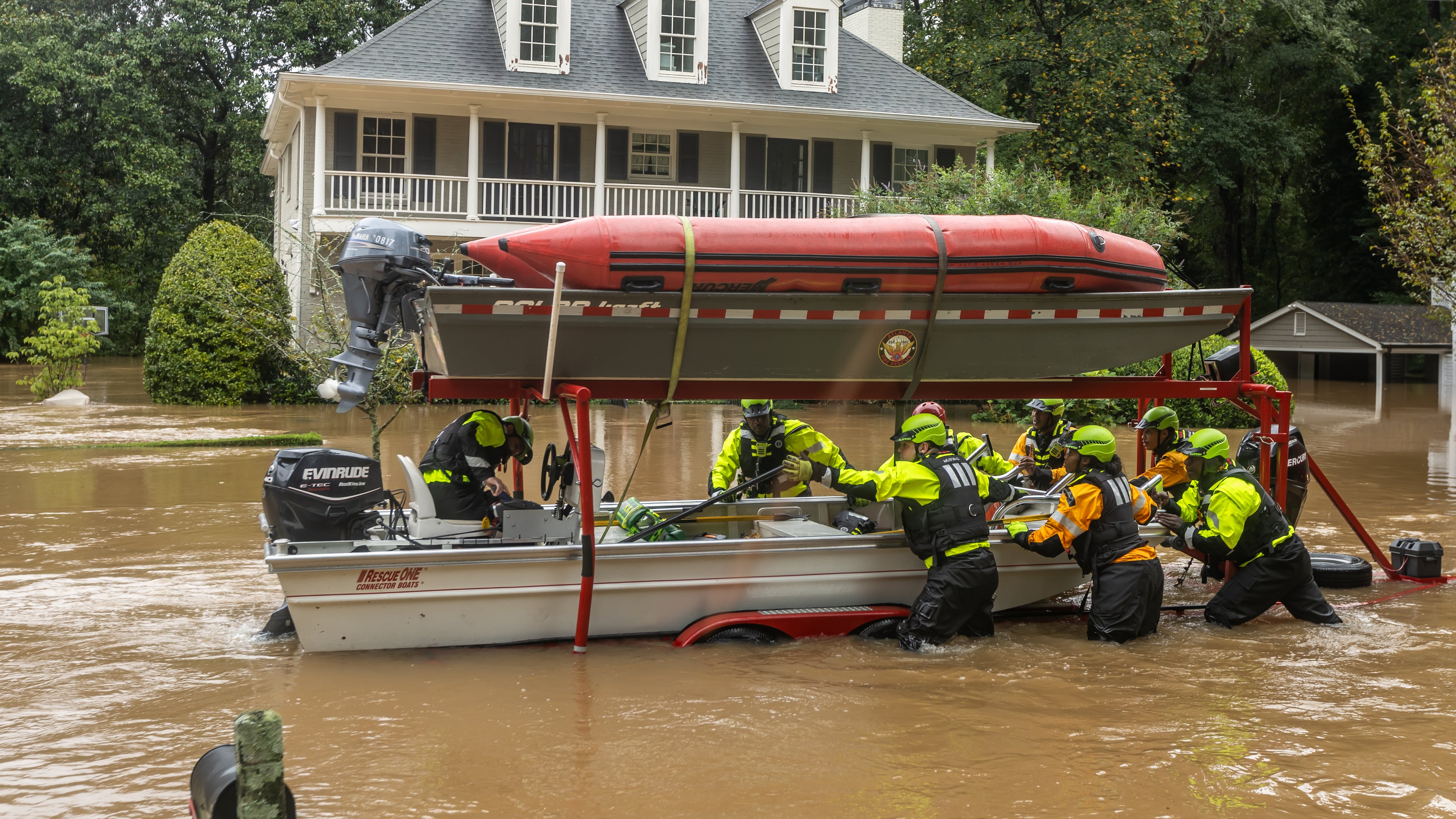 Atlanta Fire Rescue’s swift-water dive team performed welfare checks on residents on Hanover West Drive in Atlanta on Friday, Sept. 27, 2024, after Hurricane Helene caused major flooding in parts of Atlanta. (John Spink/AJC)