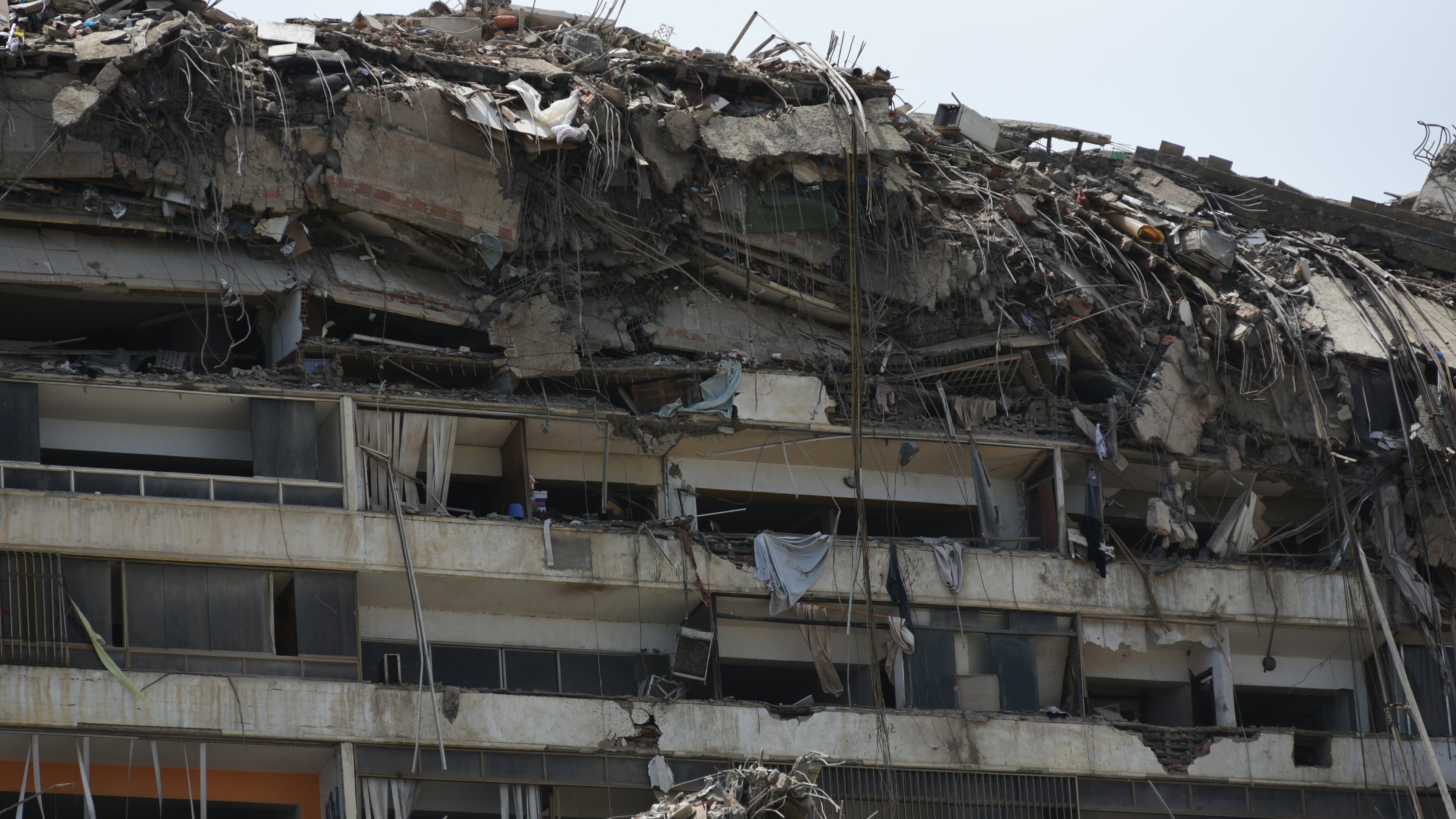 Damaged buildings stand in Catia La Mar, Venezuela, a day after an earthquake and several aftershocks struck the city, Thursday, June 25, 2026. (AP Photo/Jonathan Lanza)