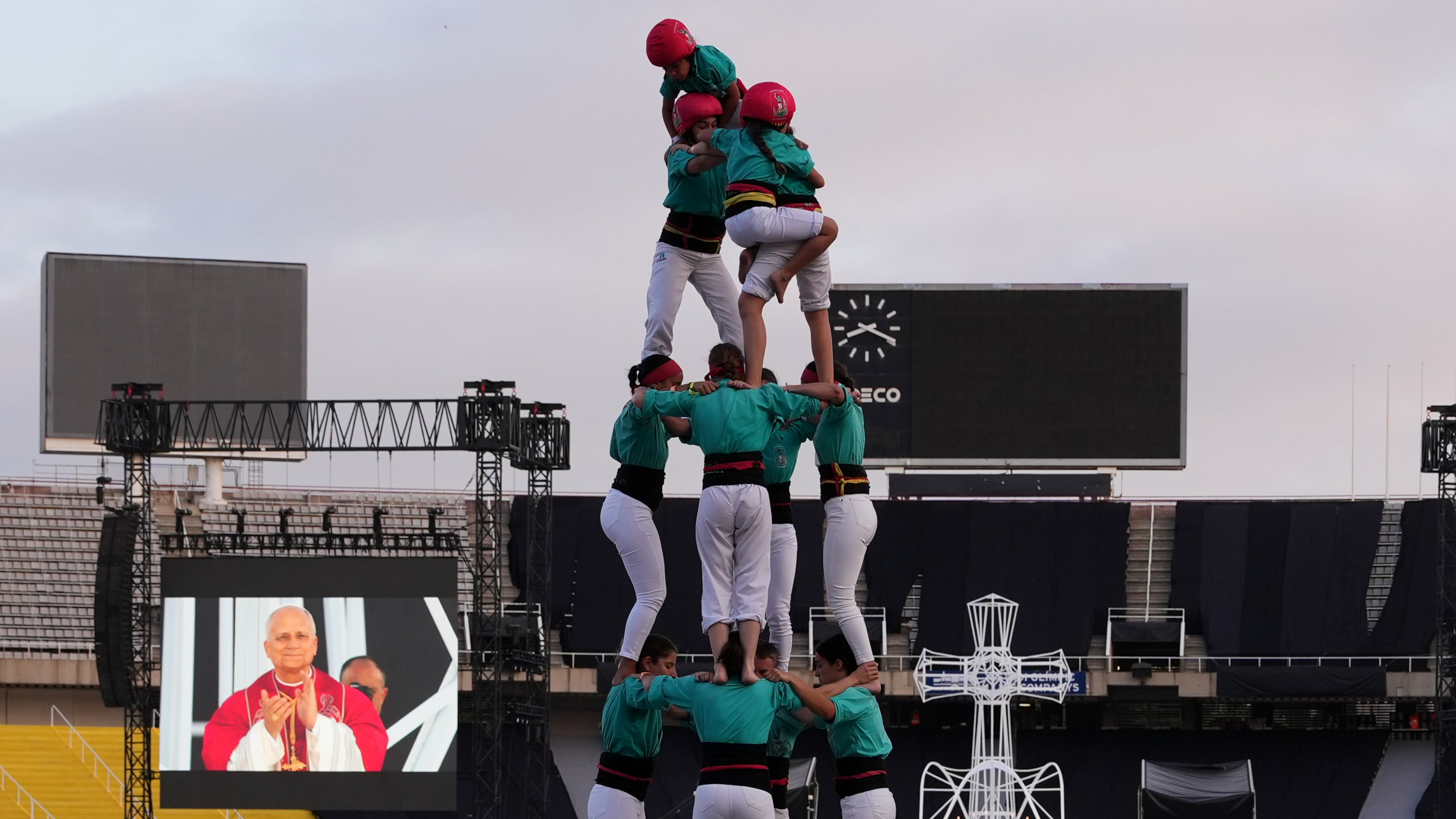 Performers make a human tower, known as Castells, for Pope Leo XIV as he leads a vigil of prayer at the Lluis Companys Olympic Stadium, in Barcelona, Tuesday, June 9, 2026. (AP Photo/Alessandra Tarantino)