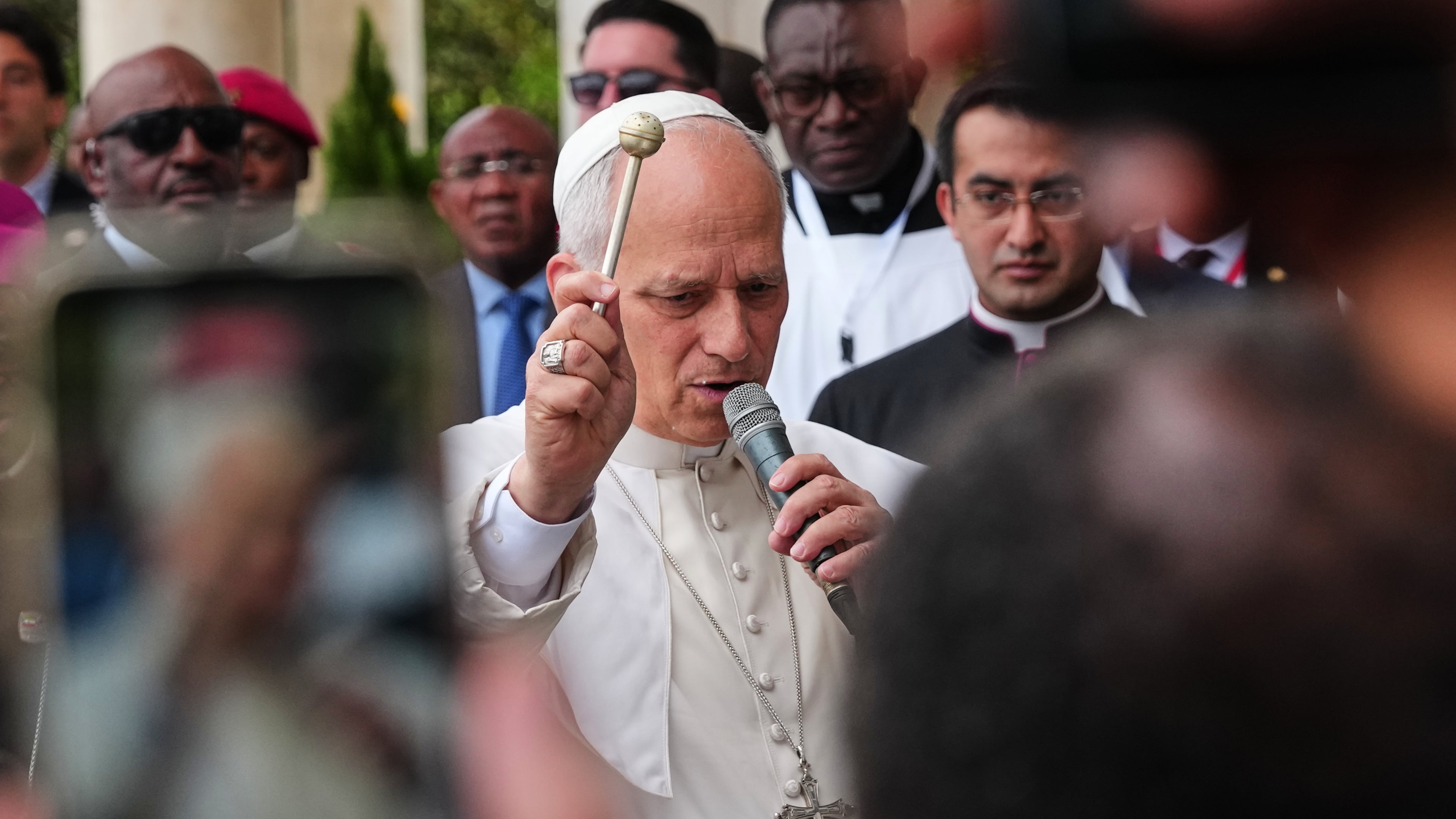 Pope Leo XIV blesses the faithful at the Basilica of the Immaculate Conception in Mongomo, Equatorial Guinea, Wednesday, April 22, 2026. (AP Photo/Misper Apawu)