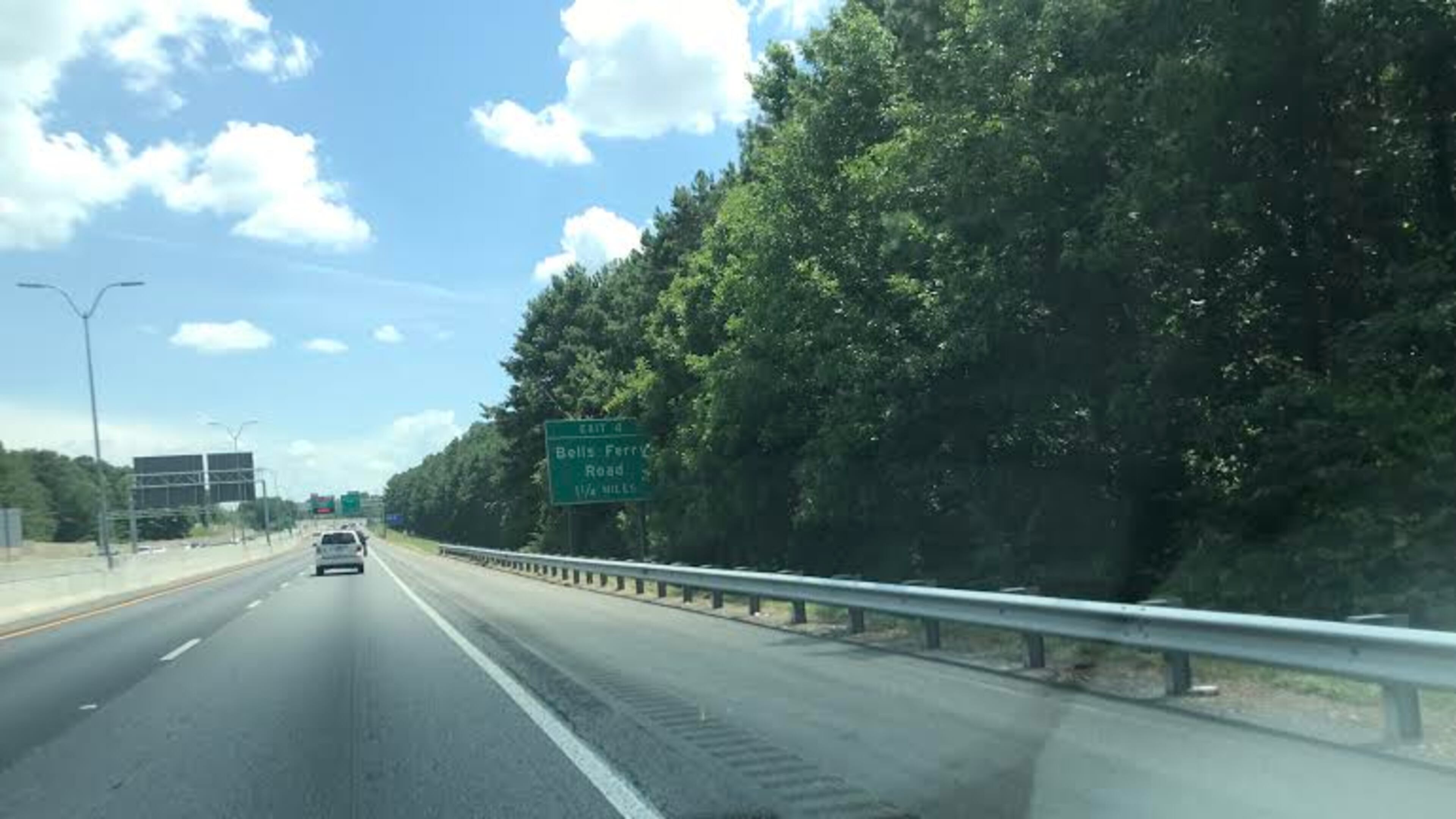 Howard Cox thinks some trees need trimmed near the first sign and extensive trimming done in the second picture. (Photos/Howard Cox)