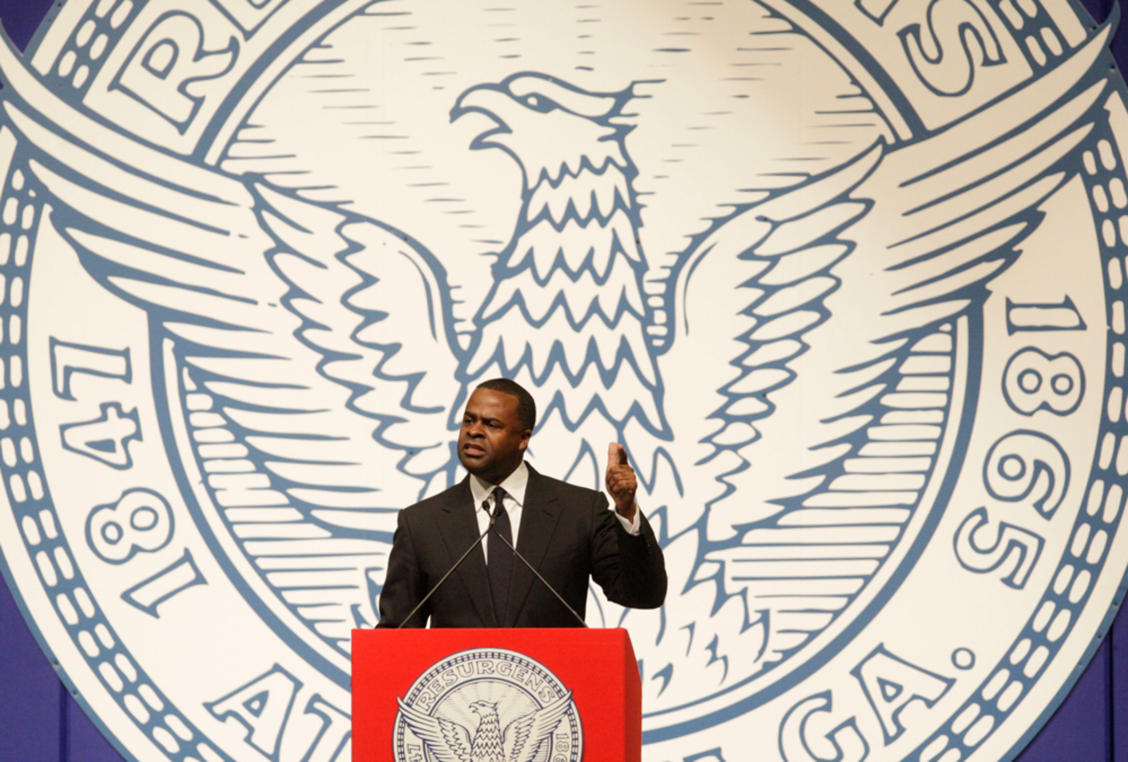 Jan. 19, 2012 - Atlanta - Atlanta Mayor Kasim Reed delivers his annual "state of the city" address Thursday at the Georgia World Congress Center. I liked the juxtaposition of the giant city seal behind him which made a routine situation visually interesting. Bob Andres bandres@ajc.com