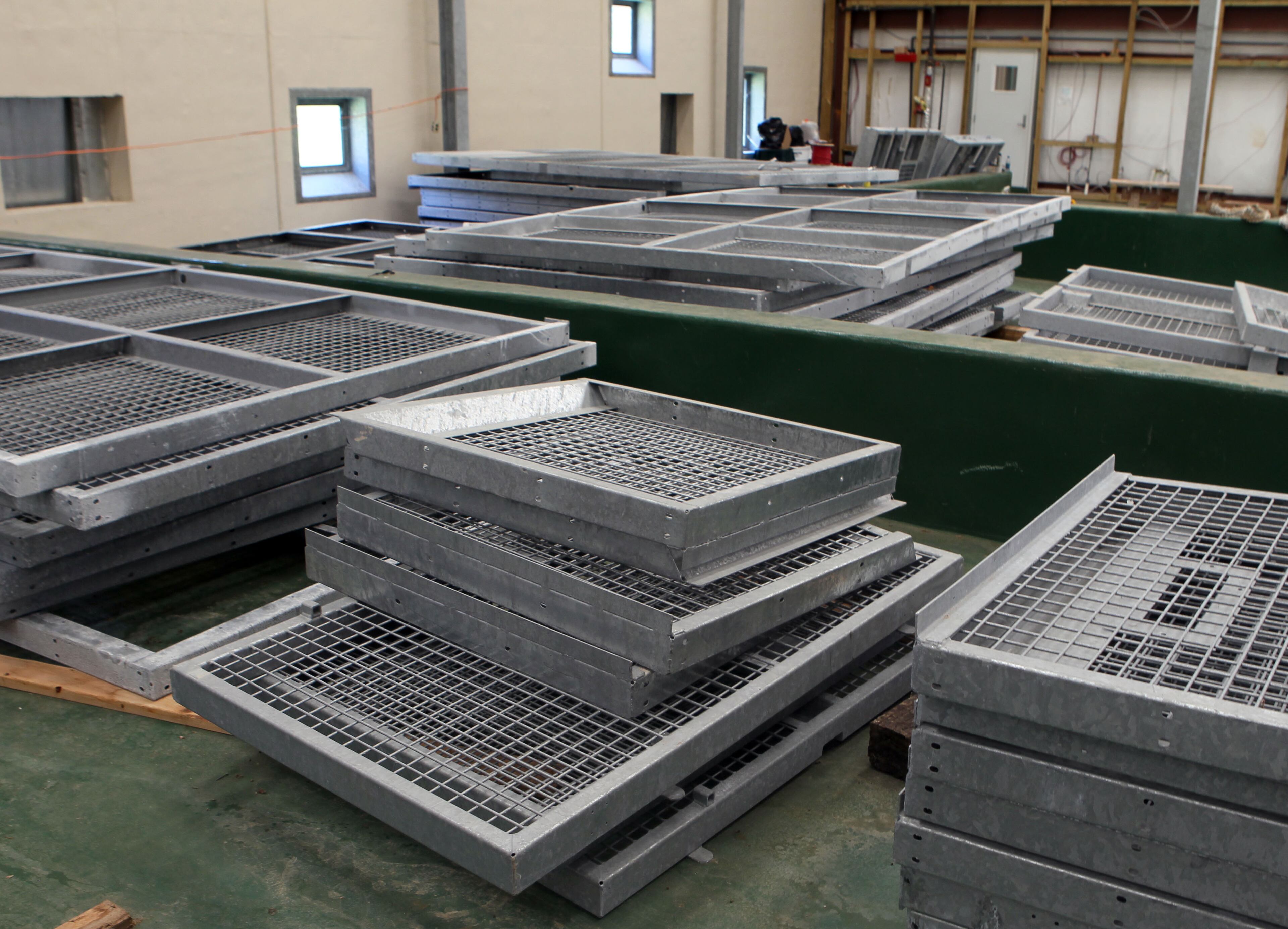 Steel work sits ready to build more indoor pens for primates.