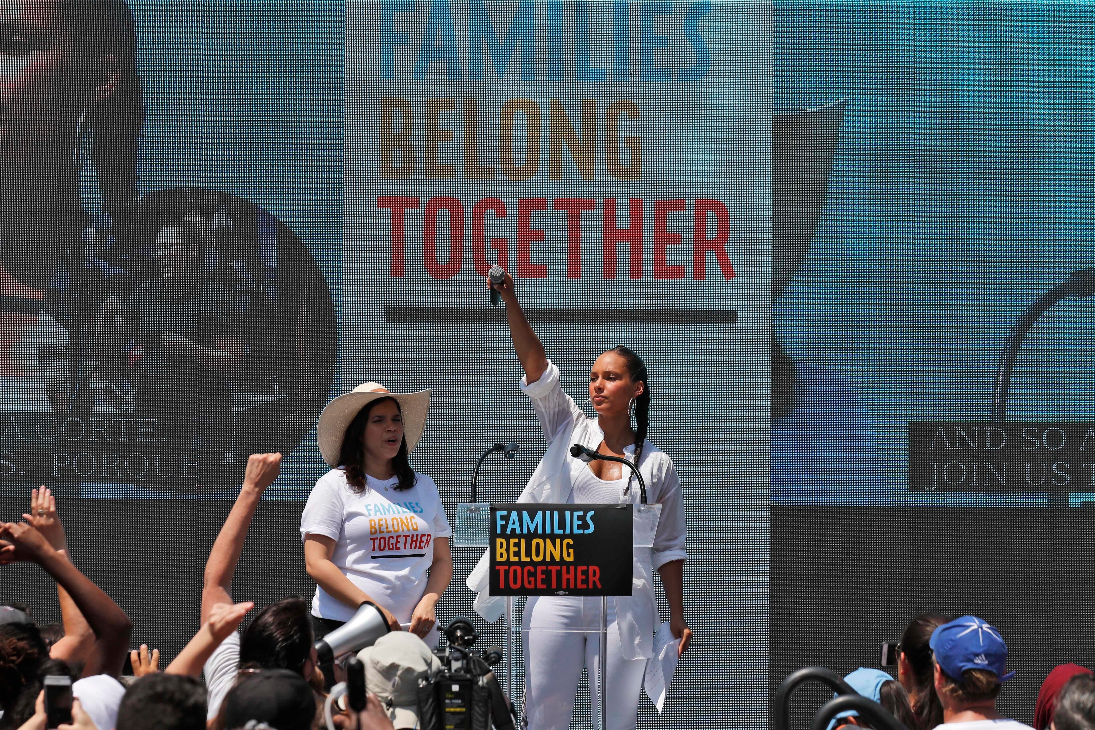 America Ferrera, left, with Alicia Keys speak during a protest of the Trump administration's approach to illegal border crossings and separation of children from immigrant parents in Lafayette Square across from the White House, Saturday, June 30, 2018, in Washington. (AP Photo/Alex Brandon)
