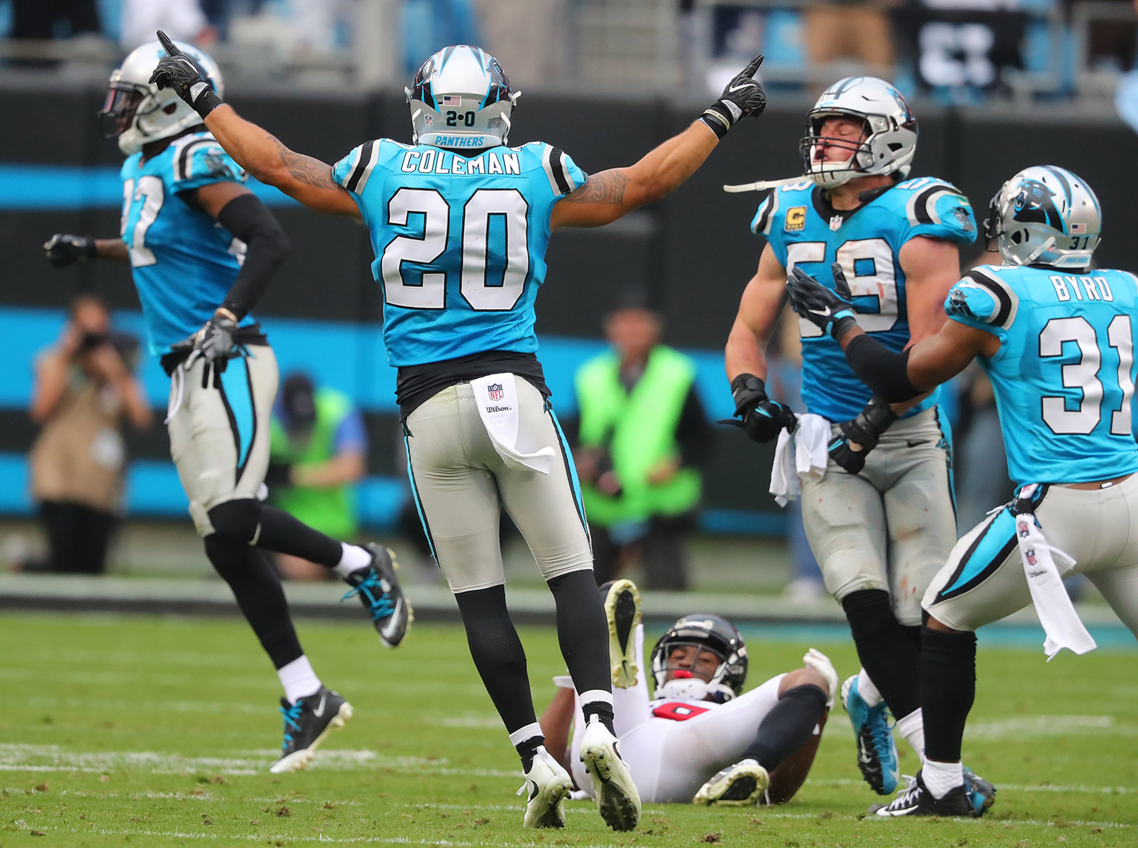 November 5, 2017 Charlotte: Falcons wide receiver Taylor Gabriel lays on the ground after an incomplete pass to him on fourth down for the Falcons final offensive play of the game in the final minutes as Panthers safety Kurt Coleman celebrates a 20-17 victory in a NFL football game on Sunday, November 5, 2017, in Charlotte. Curtis Compton/ccompton@ajc.com