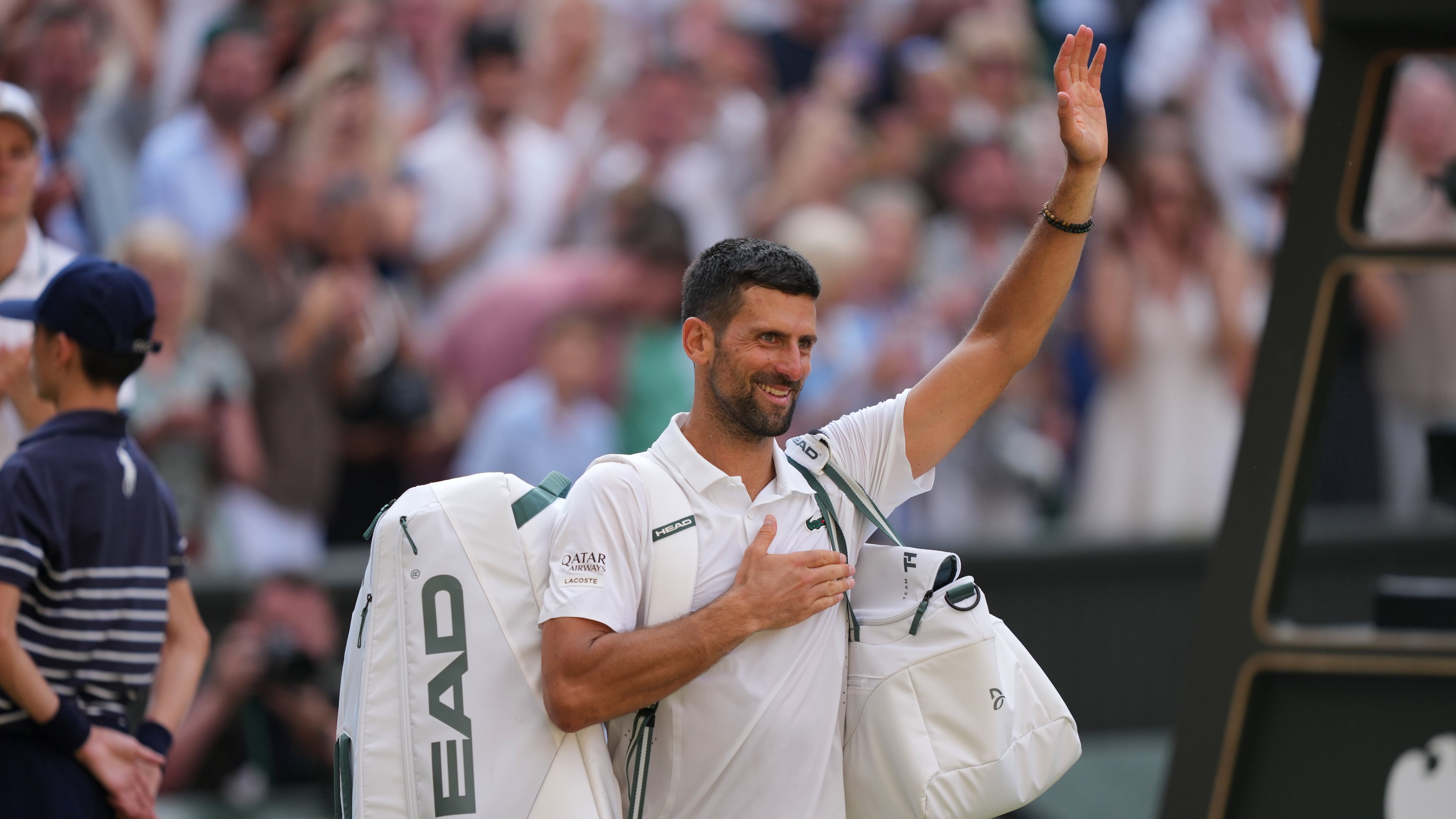 Novak Djokovic of Serbia leaves after losing to Jannik Sinner of Italy in their men's singles semifinal match at the Wimbledon Tennis Championships in London, Friday, July 10, 2026. (AP Photo/Kin Cheung)