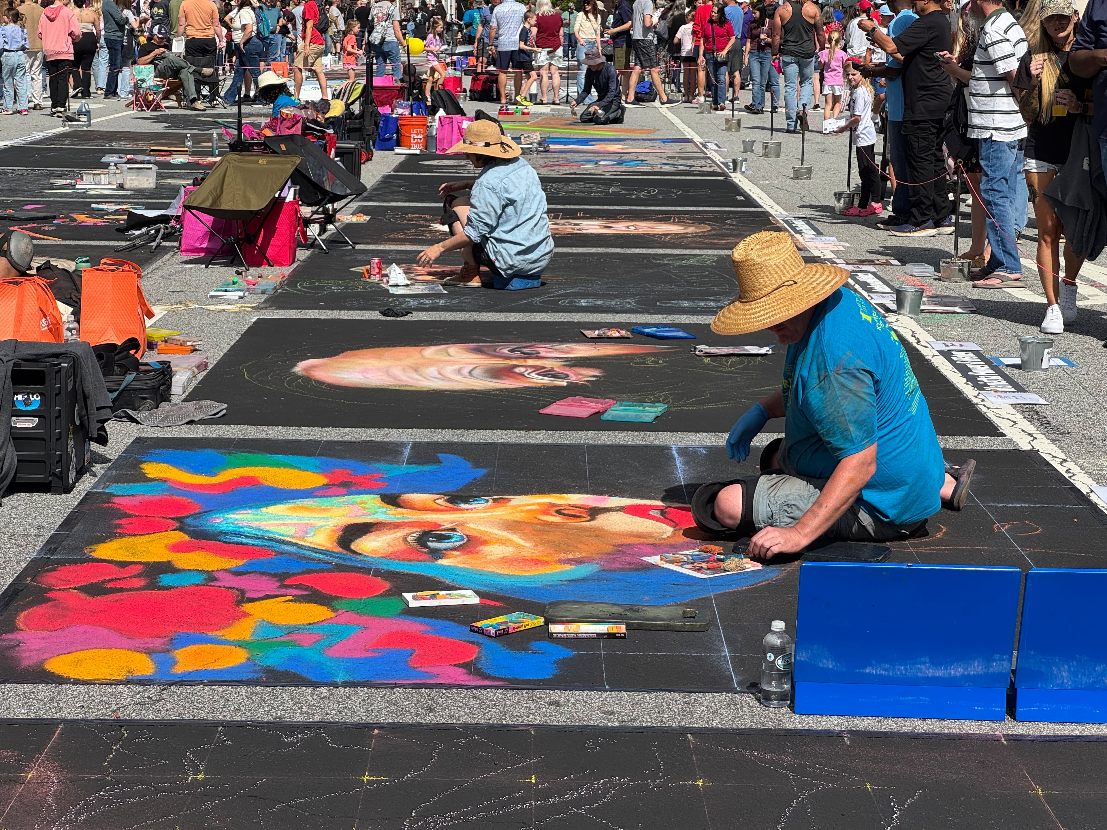 Artist Chris Brake of Atlanta works on his chalk art creation at Chalktoberfest in Marietta on Saturday, Oct. 11, 2025. (Caleb Groves/AJC)