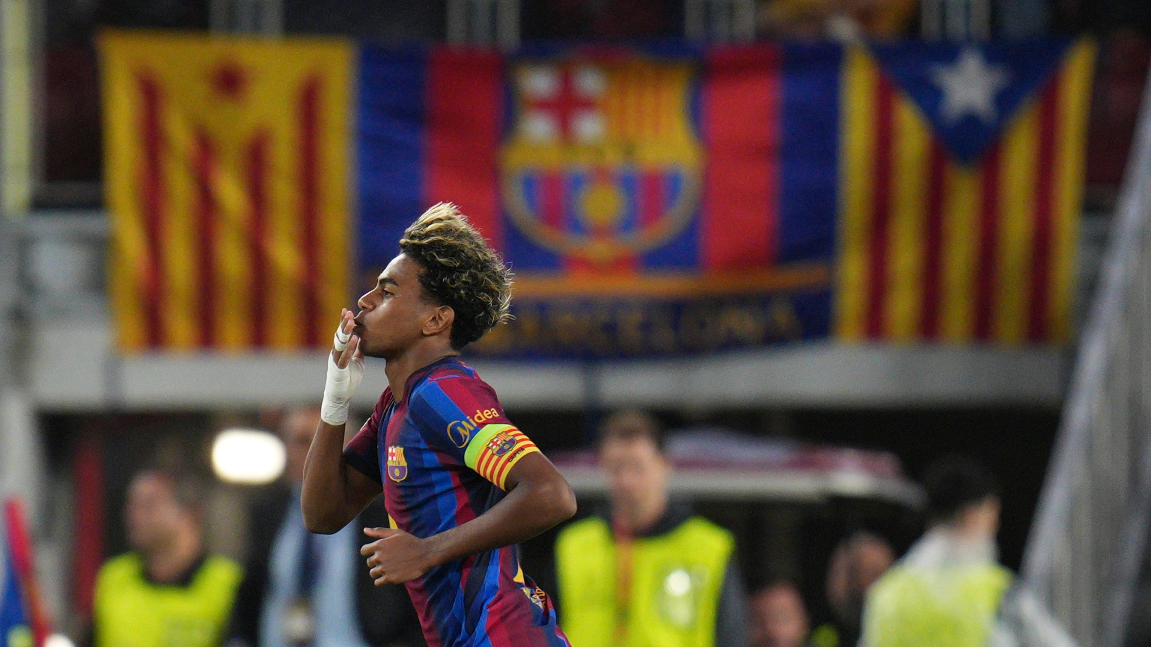 Barcelona's Lamine Yamal celebrates after scoring his side's fourth goal during the Champions League opening phase soccer between Barcelona and Feyenoord in Barcelona, Spain, Wednesday, Sept. 9, 2026.(AP Photo/Emilio Morenatti)