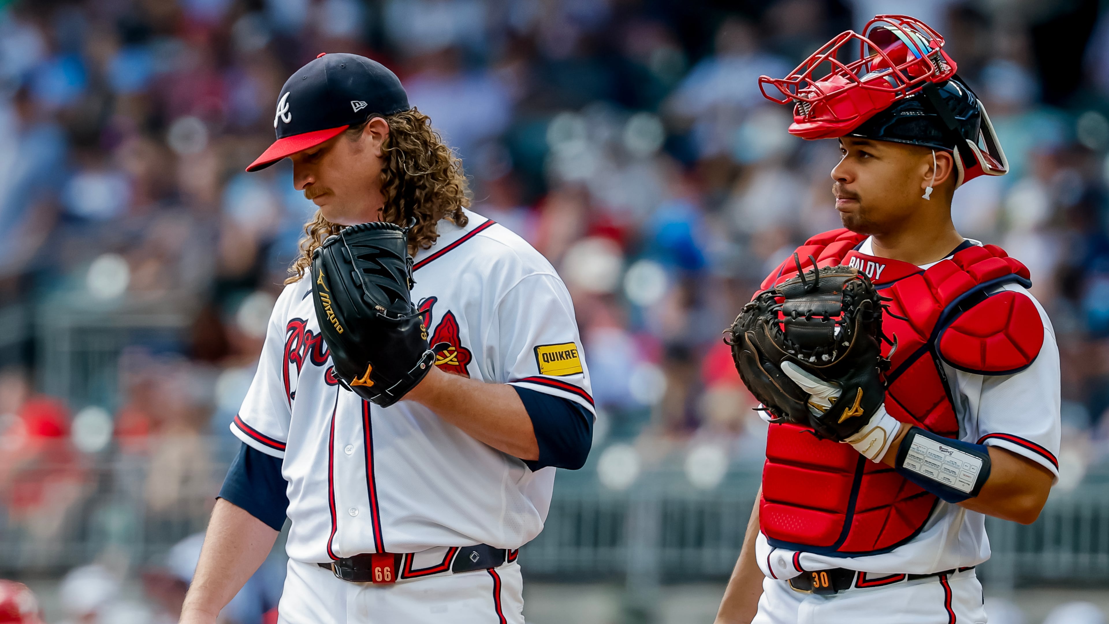 Atlanta Braves catcher Drake Baldwin (right) meets with pitcher Grant Holmes (left) during the second inning of a baseball game against the Philadelphia Phillies, Sunday, Sept. 13, 2026, in Atlanta. (Erik S. Lesser/AP)
