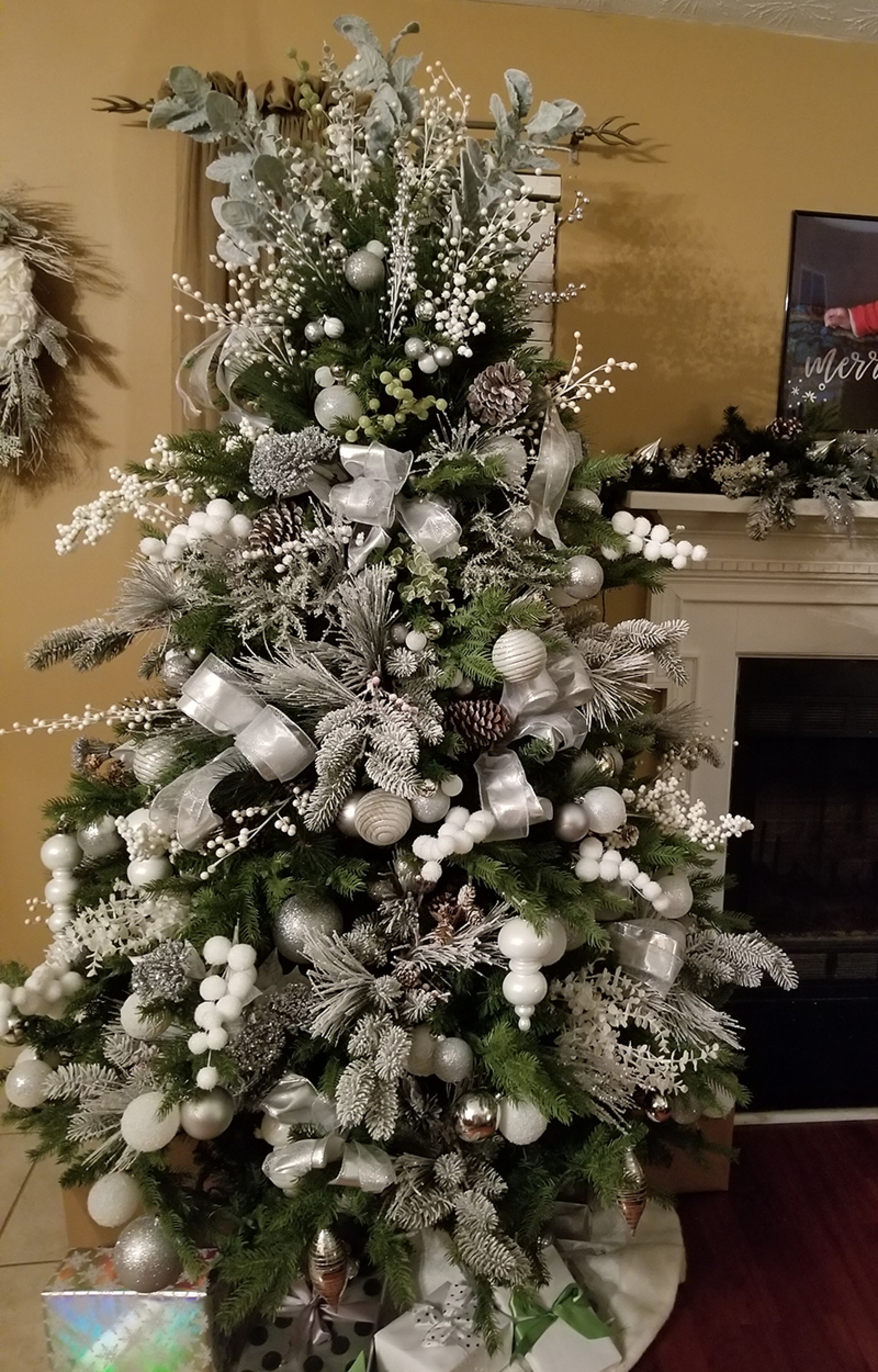 Brenda Goode all white tree looks like it's been kissed by snow.