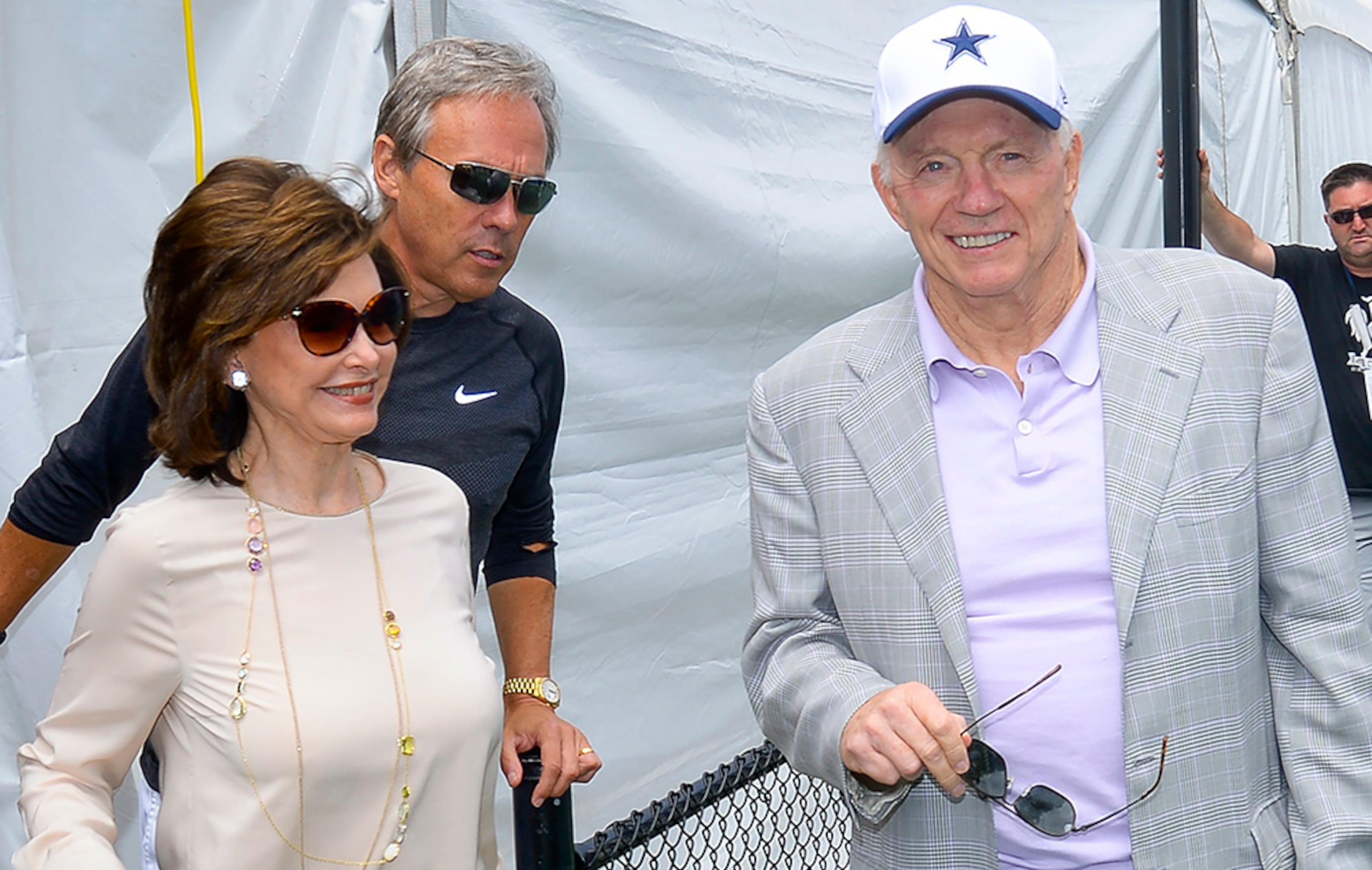 Dallas Cowboys owner Jerry Jones (right) arrives with this wife, Eugenia, (left) and team spokesman Rich Dalrymple at the "state of the team" news conference during the start of Dallas Cowboys' NFL training camp, Wednesday, July 29, 2015, in Oxnard, Calif.