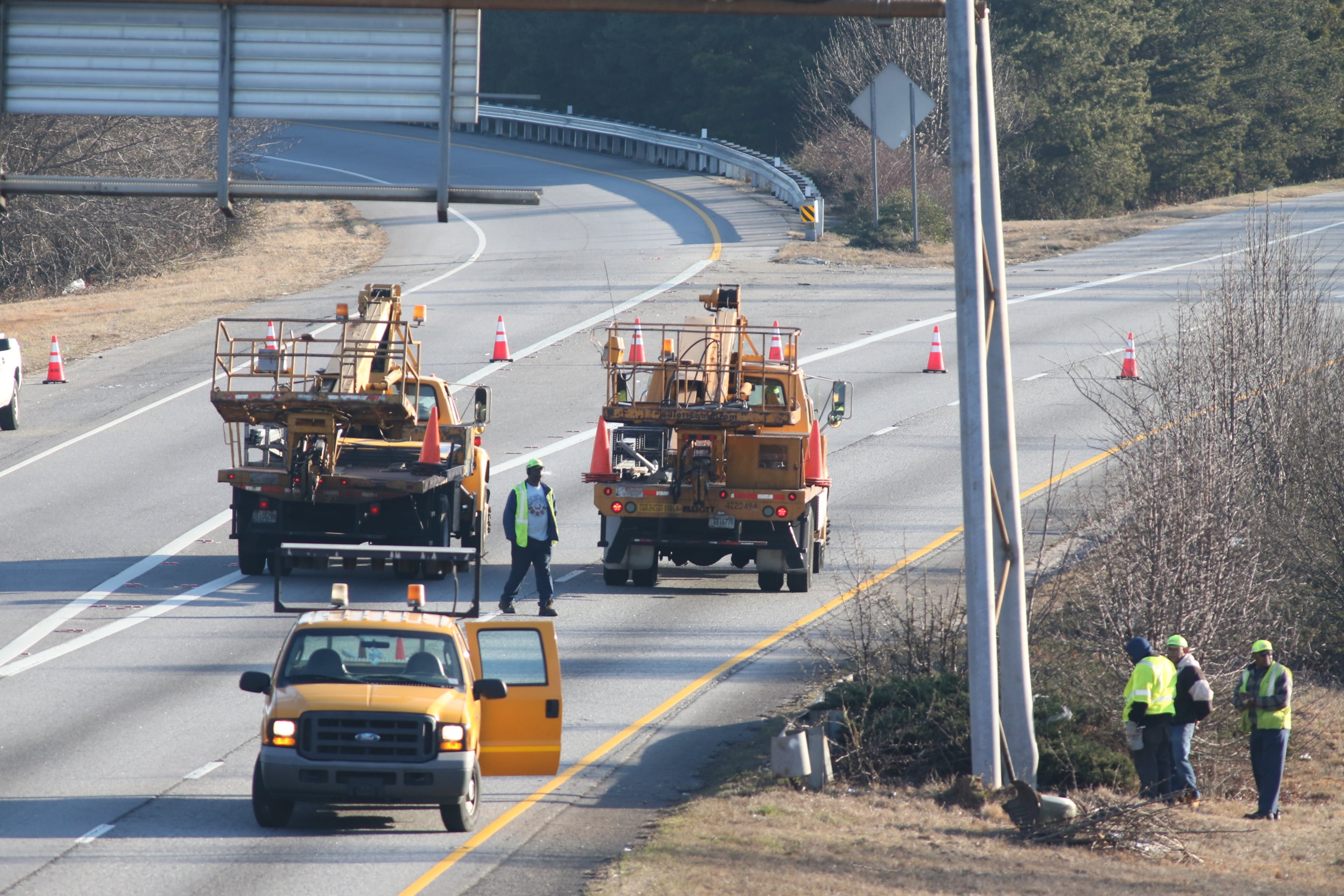 A vehicle left the roadway and slammed into pole holding up an overhead sign on a ramp from I-75 northbound to I-285 westbound in Clayton County. The crash shut the ramp and led to a five-mile backup.