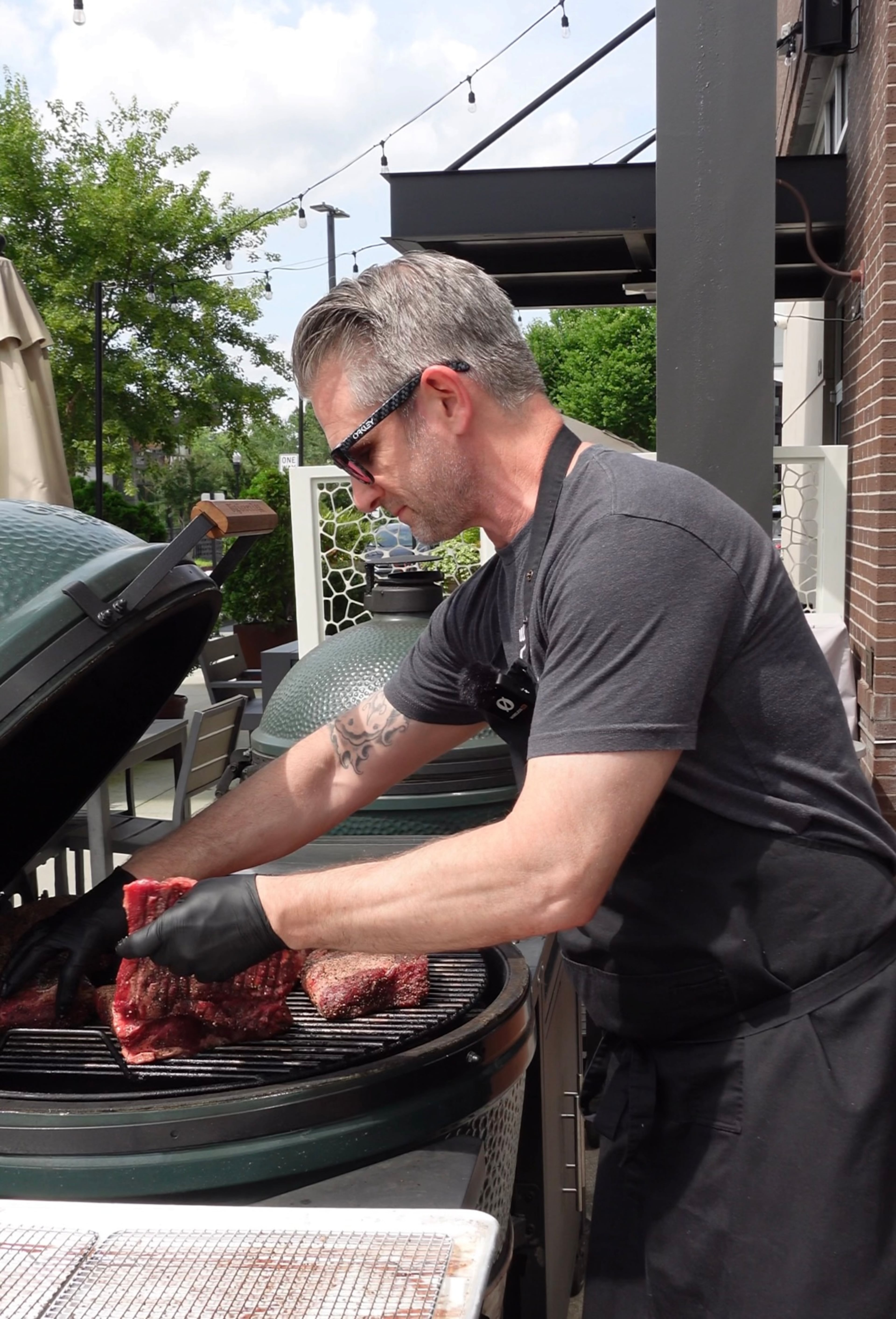 The Alden’s Jared Huck cooks on the Big Green Egg at Big Green Egg Headquarters in Atlanta. (Courtesy of Mindful Muse Media)