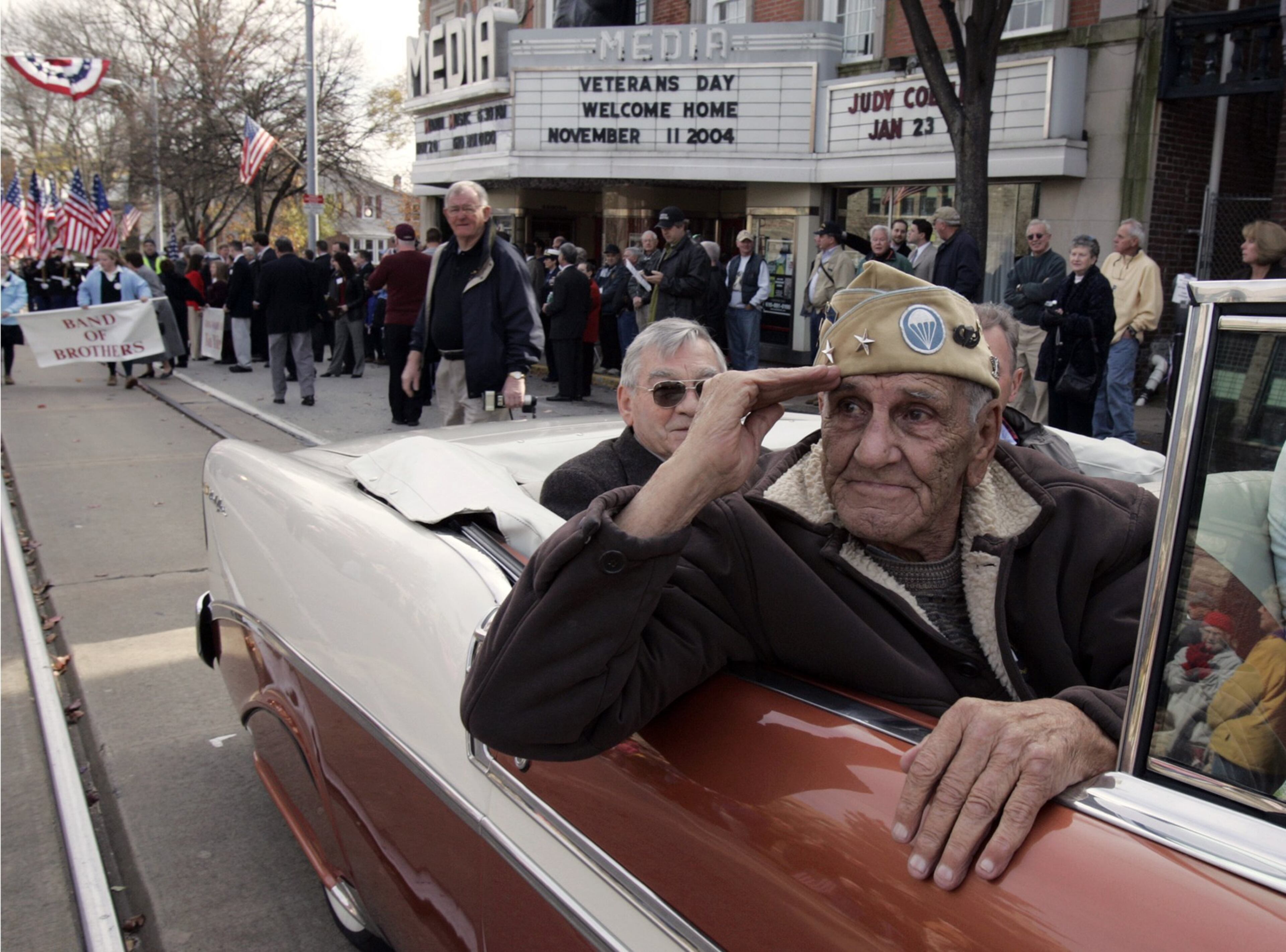 This Nov. 11, 2004 file photo shows William "Wild Bill" Guarnere participating in the Veterans Day parade in Media, Pa. Guarnere, one of the World War II veterans whose exploits were dramatized in the TV miniseries "Band of Brothers," died, Saturday, March 8, 2014, at the age of 90. (AP Photo/Jacqueline Larma, file)