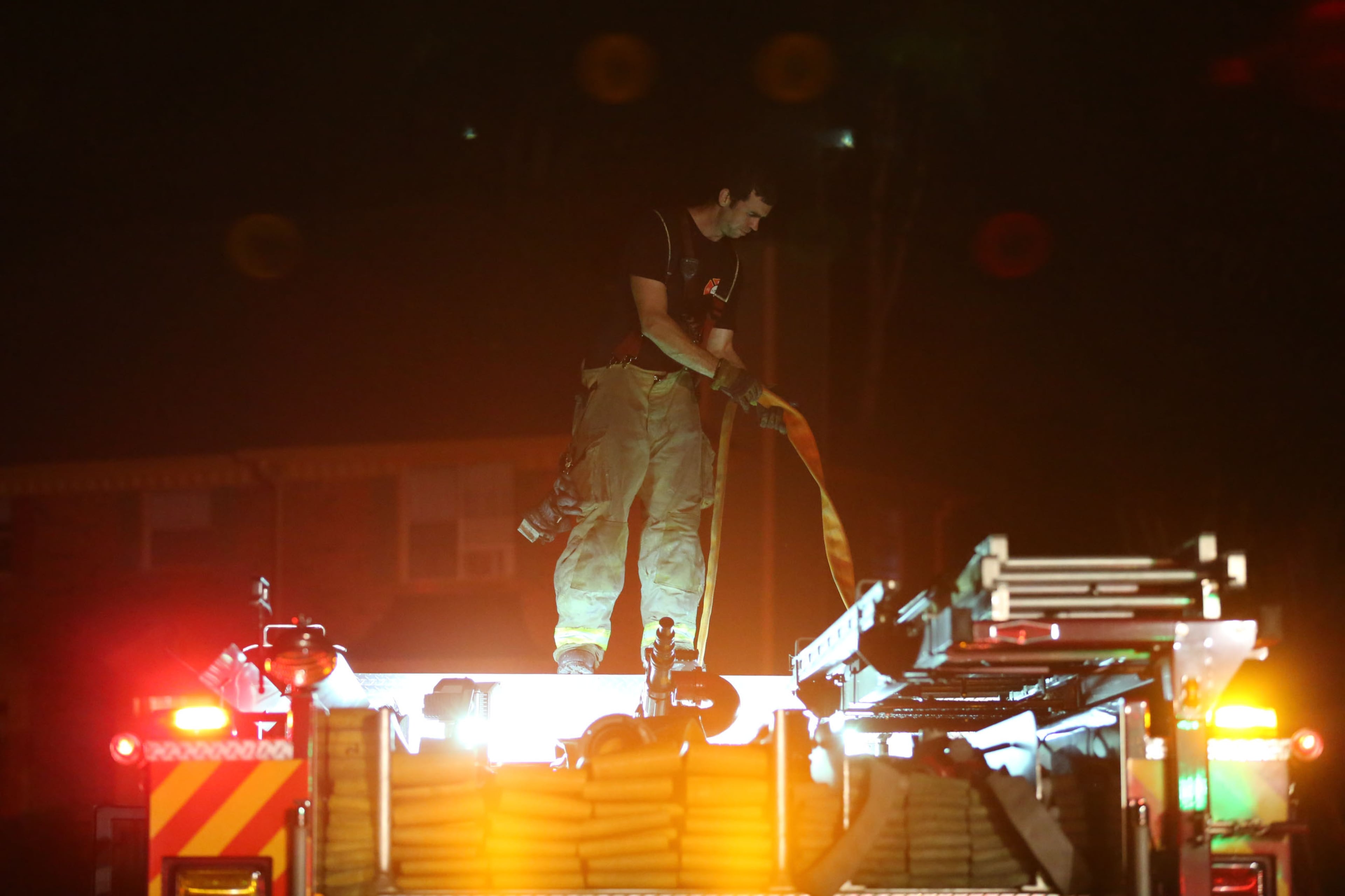 Two people died early Monday after being pulled from a burning home in Sandy Springs. The fire broke out around midnight in a duplex on North River Parkway. | JOHN SPINK/jspink@ajc.om