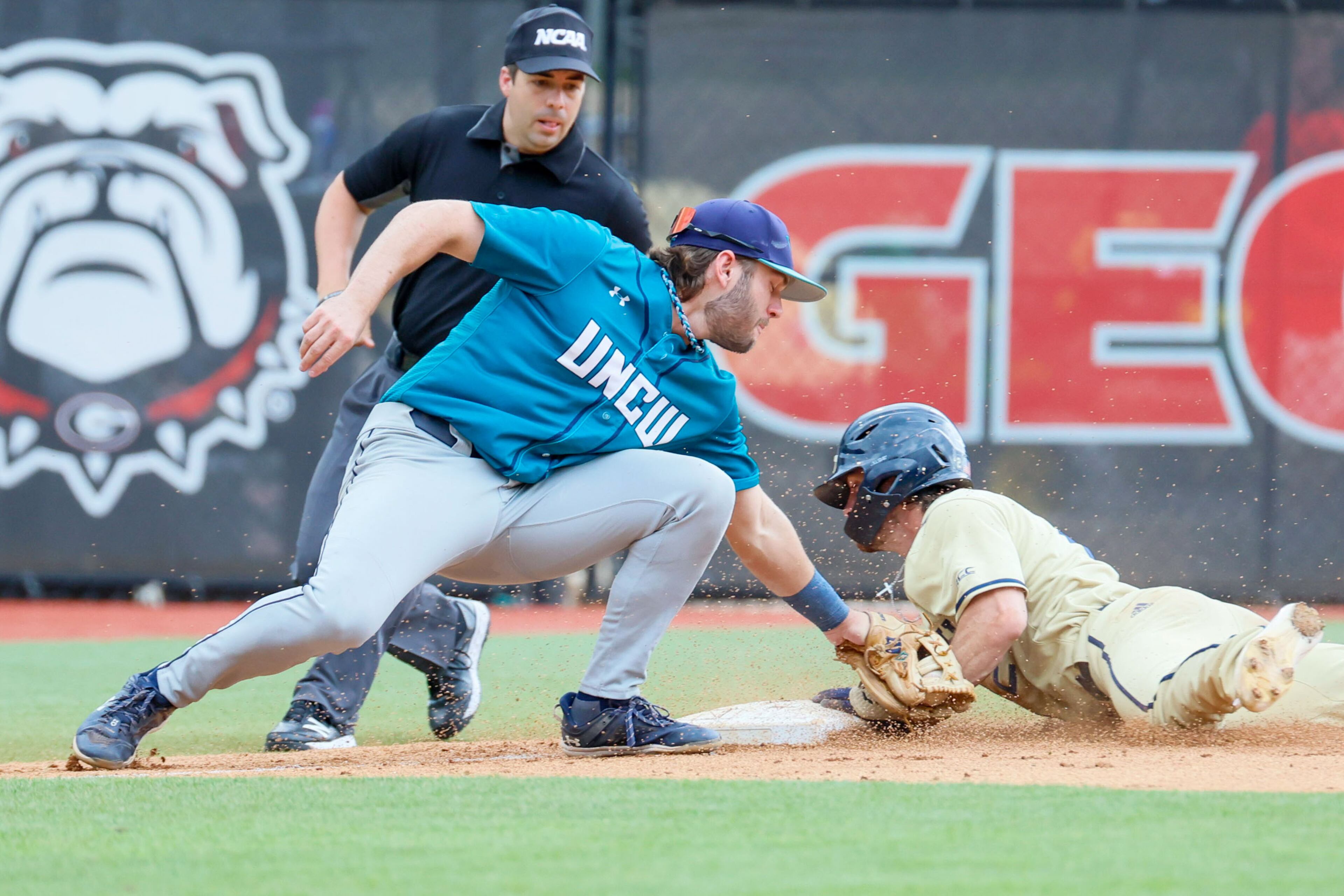 Georgia Tech pitcher Cam Jones is called safe after stealing third base during the sixth inning against UNC Wilmington during the NCAA Tournament Regional at Foley Field on Sunday, June 2, 2024, in Athens.
(Miguel Martinez / AJC)