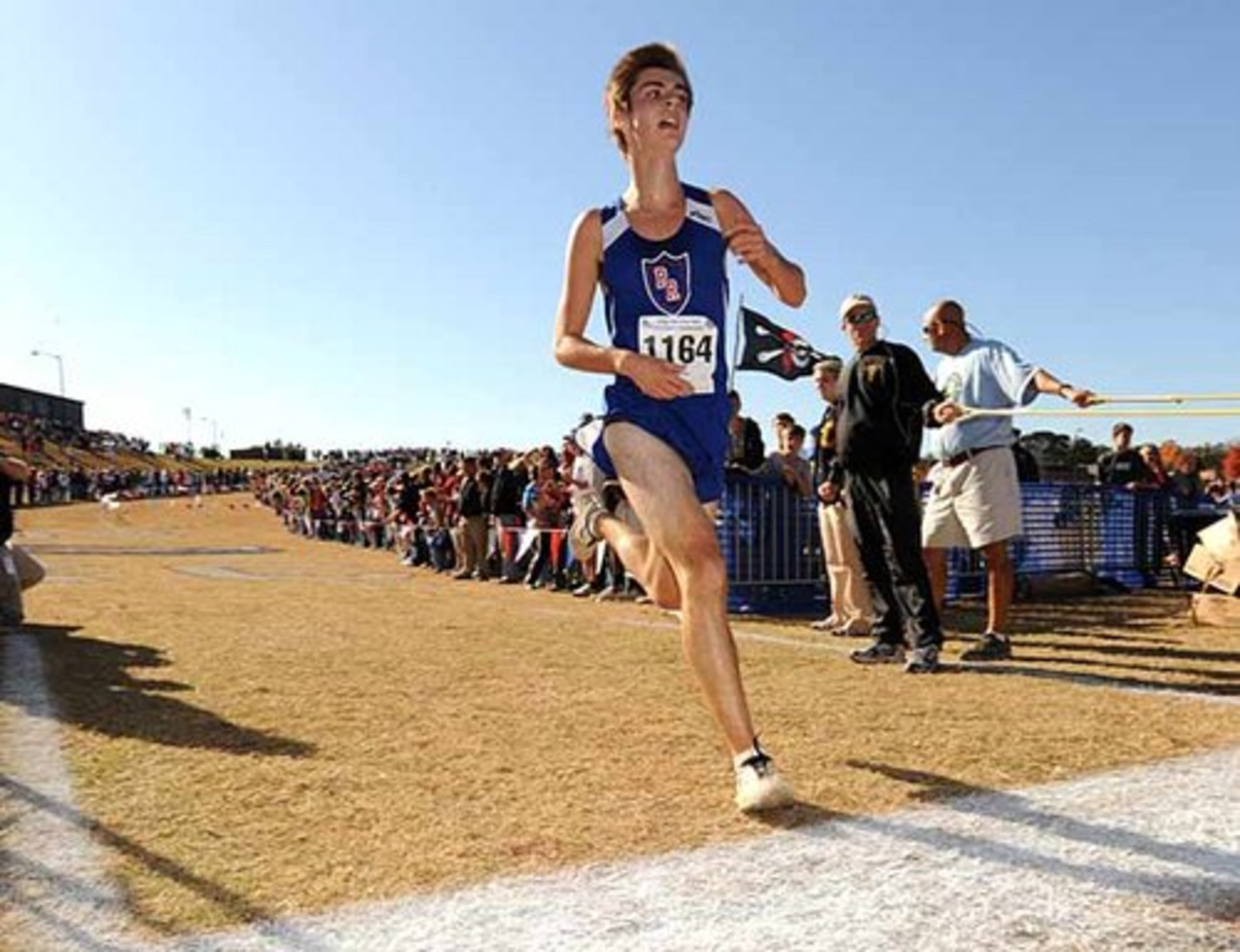 Nial Longobardi crosses the line third in the race and first for the Peachtree Ridge team.